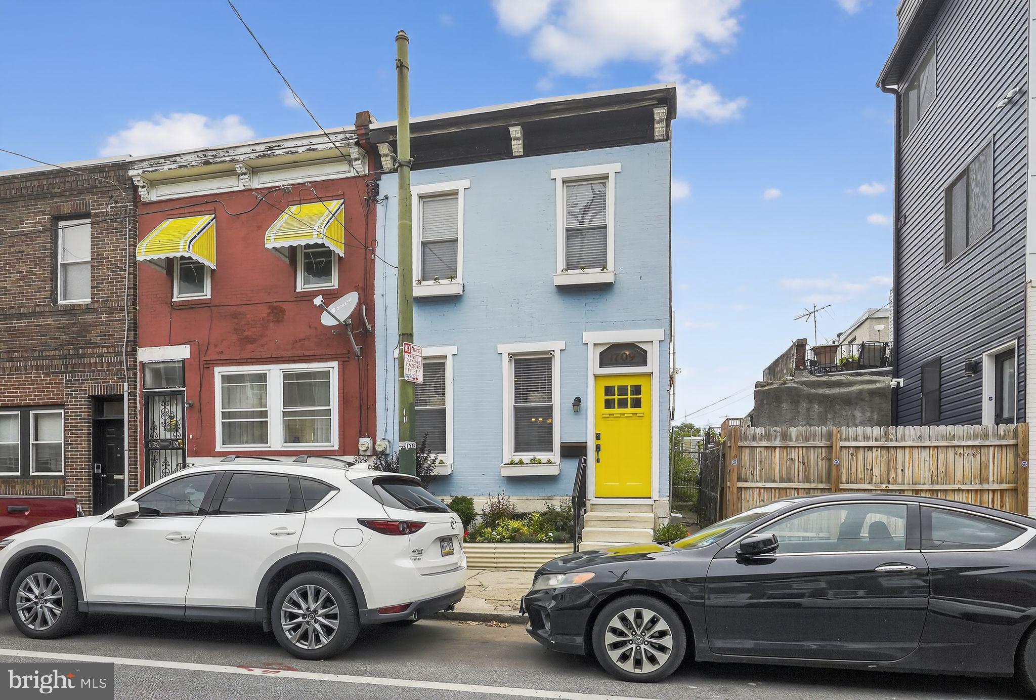 Welcome to 1709 Tasker Street! A charming blend of character, comfort, and convenience in the heart of South Philly. Lovingly maintained and thoughtfully updated, this home features original exposed brick and exposed beams, creating a warm, inviting atmosphere filled with personality. The kitchen boasts custom cabinetry made from reclaimed wood sourced from a New Jersey farm, adding a rustic touch that perfectly complements the home's unique aesthetic.
Enjoy peace of mind with updated electrical wiring (2014) and newer mechanicals, including a hot water heater and washer/dryer, both just 1 year old. Outdoor living is easy with a private back patio and a second-floor deck off the rear bedroom - perfect for morning coffee or evening relaxation.
Ideally located just 3 blocks from the Tasker-Morris stop on the Broad Street Line, commuting is a breeze and all the best of Passyunk Square is at your fingertips.