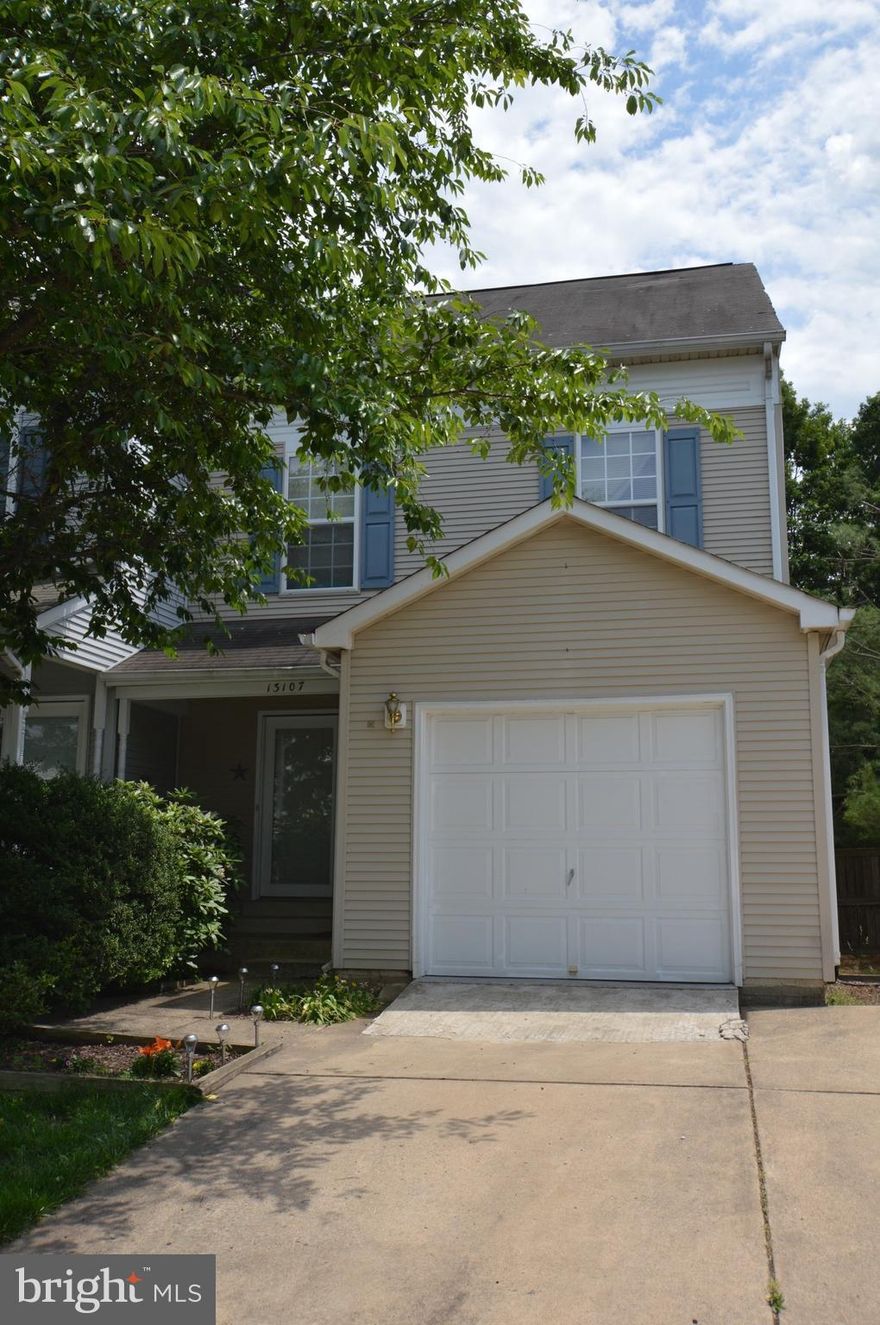 Spacious full of light end unit! Backs to woods. Huge kitchen. A lot of cabinet and countertop space. Granite countertops will be installed after current tenant leaves. Wood floors on main level. Marble fireplace. 3 full bath and 1 half bath. 3 bedrooms. Master suit with sitting room. Fully finished basement w/full bath. Large storage room. One car garage, 2-car wide driveway. Plenty of parking.