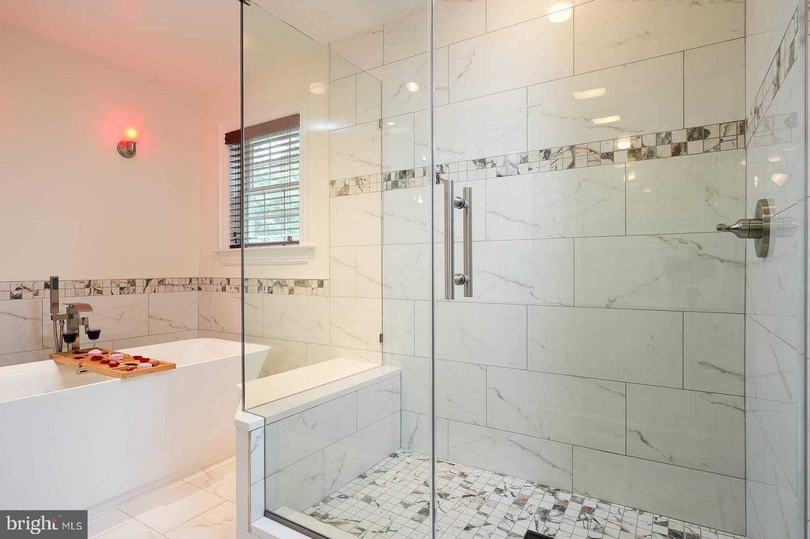 Exceptional opportunity to own in one of Bethesda’s most coveted neighborhoods - Glen Echo Heights.
Built in just 2009, yet the owner will be delivering a lot of NEW... You'll get a brand NEW Owner's Suite Bathroom with walk-in shower and soaking tub, brand NEW countertops, sink, faucet, and disposal in the kitchen, brand NEW hardwood floors throughout the entire main level and upstairs, a brand NEW main level bathroom, and an updated second bathroom on the upper level. And you'll love the space in the massive 3-car garage entered off the stamped concrete driveway. Enjoy your private and peaceful backyard oasis that’s low maintenance - featuring an enclosed deck off the main level with a retractable awning and a clear roof covered hot tub.
Glen Echo Heights is a peaceful, tree-filled neighborhood known for its natural beauty and strong community spirit, offering the perfect balance of country feel yet just a few minutes to both the Potomac River and trails and downtown Bethesda and Chevy Chase. The area features top-rated schools -- including Walt Whitman High School.
Schedule your private showing today and discover why Glen Echo Heights residents consistently praise this as “a charming place to live” with exceptional “natural beauty and strong sense of community.”