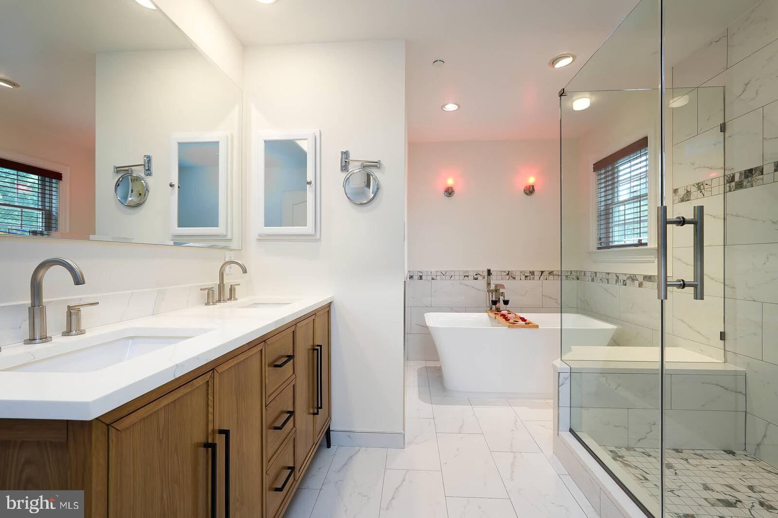 Exceptional opportunity to own in one of Bethesda’s most coveted neighborhoods - Glen Echo Heights.
Built in just 2009, yet the owner will be delivering a lot of NEW... You'll get a brand NEW Owner's Suite Bathroom with walk-in shower and soaking tub, brand NEW countertops, sink, faucet, and disposal in the kitchen, brand NEW hardwood floors throughout the entire main level and upstairs, a brand NEW main level bathroom, and an updated second bathroom on the upper level. And you'll love the space in the massive 3-car garage entered off the stamped concrete driveway. Enjoy your private and peaceful backyard oasis that’s low maintenance - featuring an enclosed deck off the main level with a retractable awning and a clear roof covered hot tub.
Glen Echo Heights is a peaceful, tree-filled neighborhood known for its natural beauty and strong community spirit, offering the perfect balance of country feel yet just a few minutes to both the Potomac River and trails and downtown Bethesda and Chevy Chase. The area features top-rated schools -- including Walt Whitman High School.
Schedule your private showing today and discover why Glen Echo Heights residents consistently praise this as “a charming place to live” with exceptional “natural beauty and strong sense of community.”