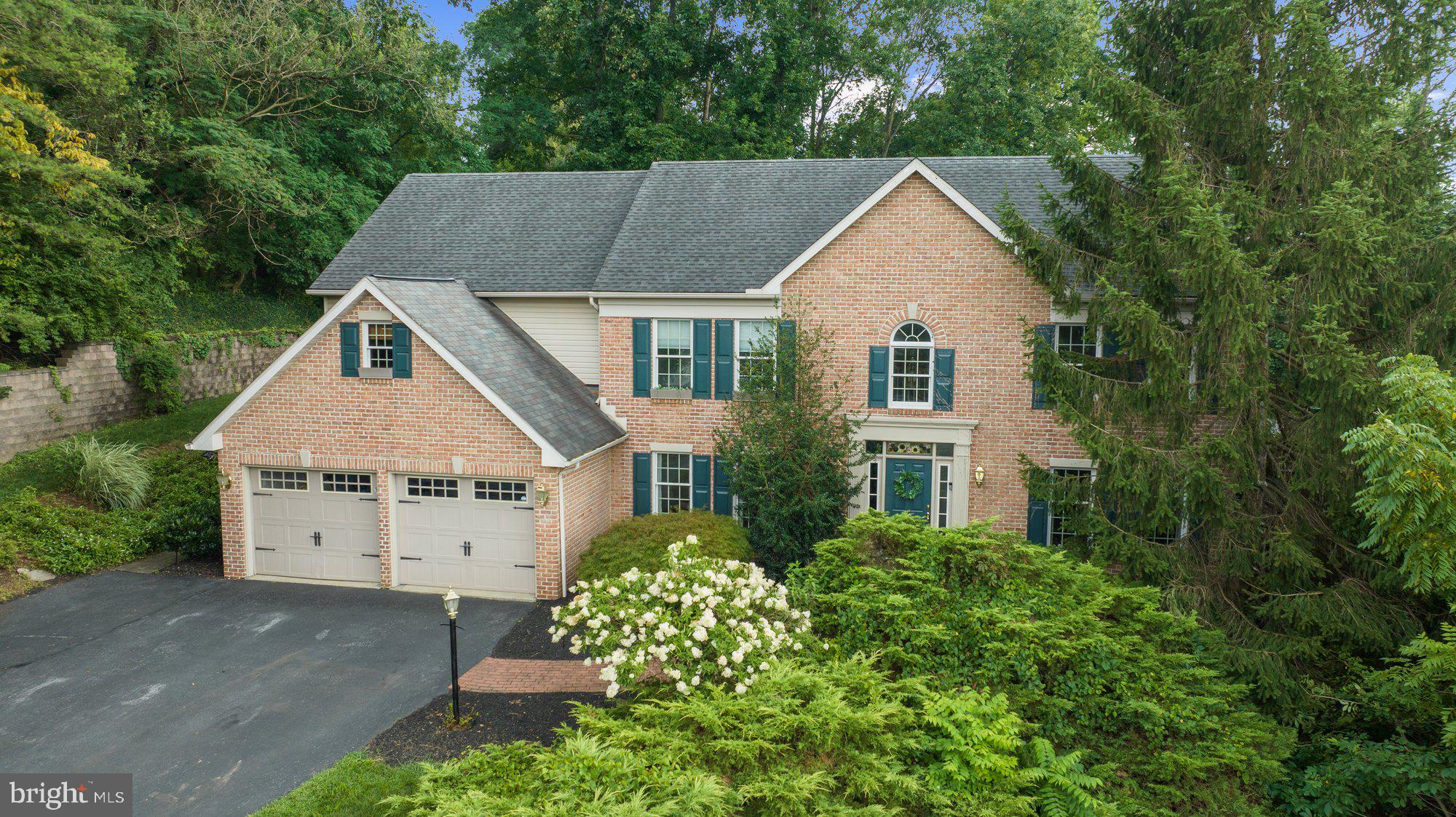 Fabulous Custom Two Story Home in The Heart of Exeter Twp. It feels like you're in the Country, but you can walk to Three Schools. This home has Five Bedrooms and 3.5 Baths. Custom Kitchen with Bosch Appliance Package. Formal Living and Dining Rooms. Gorgeous Brazilian Cherry Hardwood Floors, Three Fireplaces,
Vaulted Ceilings, Full Court Basketball Hoops, Hot Tub, Full Finished Walkout Daylight Basement, Porch Swing Daybed, Slate Patio, and More! All of this sits on 1.23 Hilltop Wooded Acres.