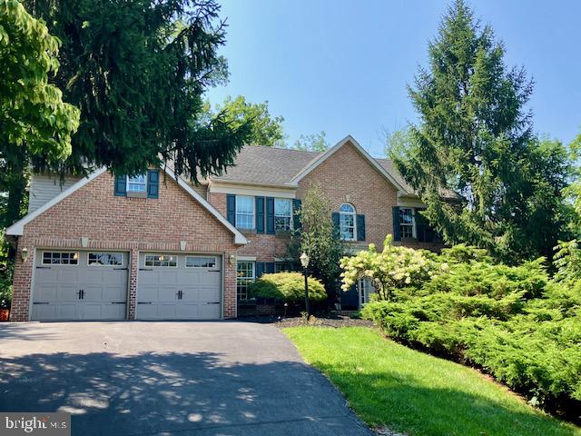 Fabulous Custom Two Story Home in The Heart of Exeter Twp. It feels like you're in the Country, but you can walk to Three Schools. This home has Five Bedrooms and 3.5 Baths. Custom Kitchen with Bosch Appliance Package. Formal Living and Dining Rooms. Gorgeous Brazilian Cherry Hardwood Floors, Three Fireplaces,
Vaulted Ceilings, Full Court Basketball Hoops, Hot Tub, Full Finished Walkout Daylight Basement, Porch Swing Daybed, Slate Patio, and More! All of this sits on 1.23 Hilltop Wooded Acres.