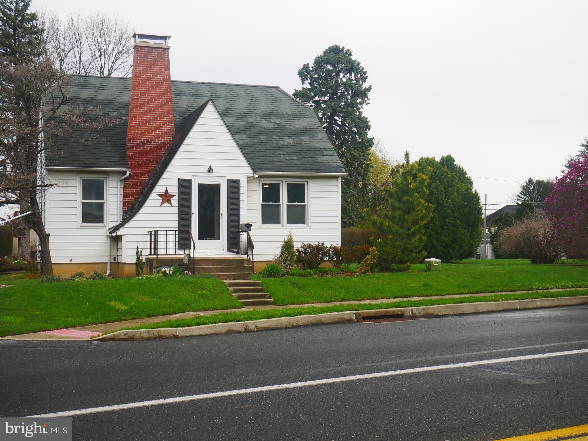 Here is an adorable 4 bedroom Palmyra cape cod on a large lot just waiting to become your new home! The interior is freshly painted and the wood floors have been refinished so all you need to do is move in. The first floor features a living room with a cozy fireplace, a large eat-in kitchen with lots of retro cabinetry and stainless steel appliances, a sunny primary bedroom, a full hall bath, and a small bedroom which could also be a great office, nursery, or den. On the second floor there are two good sized bedrooms with large closets nearby for storage. The full basement has the laundry area, a second shower and sink, and workshop and storage areas. There's a nearly new boiler to keep you warm during the winter. Outside you'll find a shed, a two car detached garage and a large in-ground pool so you can vacation at home! All this at an affordable price. Come take a look before it's gone!