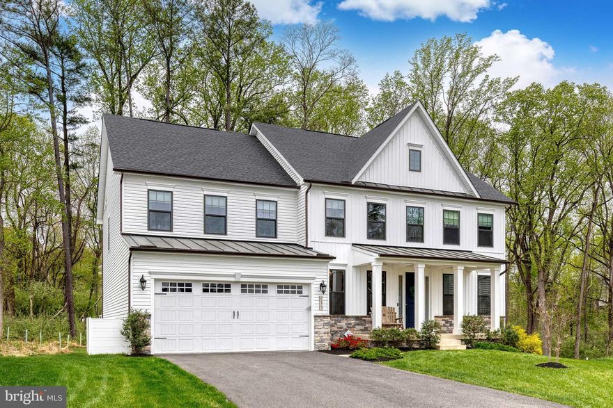 Welcome to 7679 Cross Creek Drive—an extraordinary Craftsman-style home tucked away on a private cul-de-sac in Columbia’s highly sought-after Cedar Creek community. Built in 2022, this spacious and impeccably upgraded residence offers a total of 5,488 finished square feet, including 4,068 sq ft above grade and an additional 1,420 sq ft of beautifully finished living space below grade.

The main level is thoughtfully designed for both everyday comfort and impressive entertaining. It features a private office with custom built-ins, perfect for storage, display, and working from home. A main-level bedroom with a full bath provides flexibility for guests or multigenerational living. The inviting family room with a gas fireplace flows effortlessly into the heart of the home—the gourmet kitchen, which showcases quartz countertops, soft-close cabinetry, stainless steel appliances, a custom-shelved walk-in pantry, and a large center island that opens to a spacious dining area.

Upstairs, you’ll find four generously sized bedrooms, each with walk-in closets. The owner’s suite is a private retreat featuring two massive custom California closets and a luxurious spa bath with a standalone soaking tub, dual vanities, and a walk-in shower with dual shower heads. Two of the secondary bedrooms share a stylish Jack and Jill bathroom, while the fourth bedroom enjoys its own en-suite bath—perfect for guests or older children. The finished upper-level laundry room adds extra convenience with built-in cabinetry and ample folding space.

The fully finished lower level provides exceptional flexibility and includes a recreation room, private gym, spacious bedroom, full bathroom, and a stunning custom bar area—ideal for entertaining or creating the ultimate hangout space. 

Step outside to an outdoor oasis that backs to a private nature preserve, offering serene views and a sense of seclusion. Enjoy the outdoors from the screened-in, covered porch with its own fireplace, which opens to an uncovered deck with stairs leading down to the backyard retreat—a perfect space for relaxing or entertaining amid the beauty of the surrounding landscape.

Not your average garage - this fully finished two car space stuns with showroom-worthy epoxy floors, sleek built-in storage cabinets, and a  Level 2 electric vehicle charger for the ultimate in style and function.

Located in a thoughtfully designed community featuring open green space for play and gatherings, playgrounds, and scenic walking trails, this home truly offers the best of lifestyle, comfort, and community.

Don’t miss this rare opportunity to own one of Cedar Creek’s most upgraded and expansive homes—schedule your private showing today!

Rental Opportunity Available :)