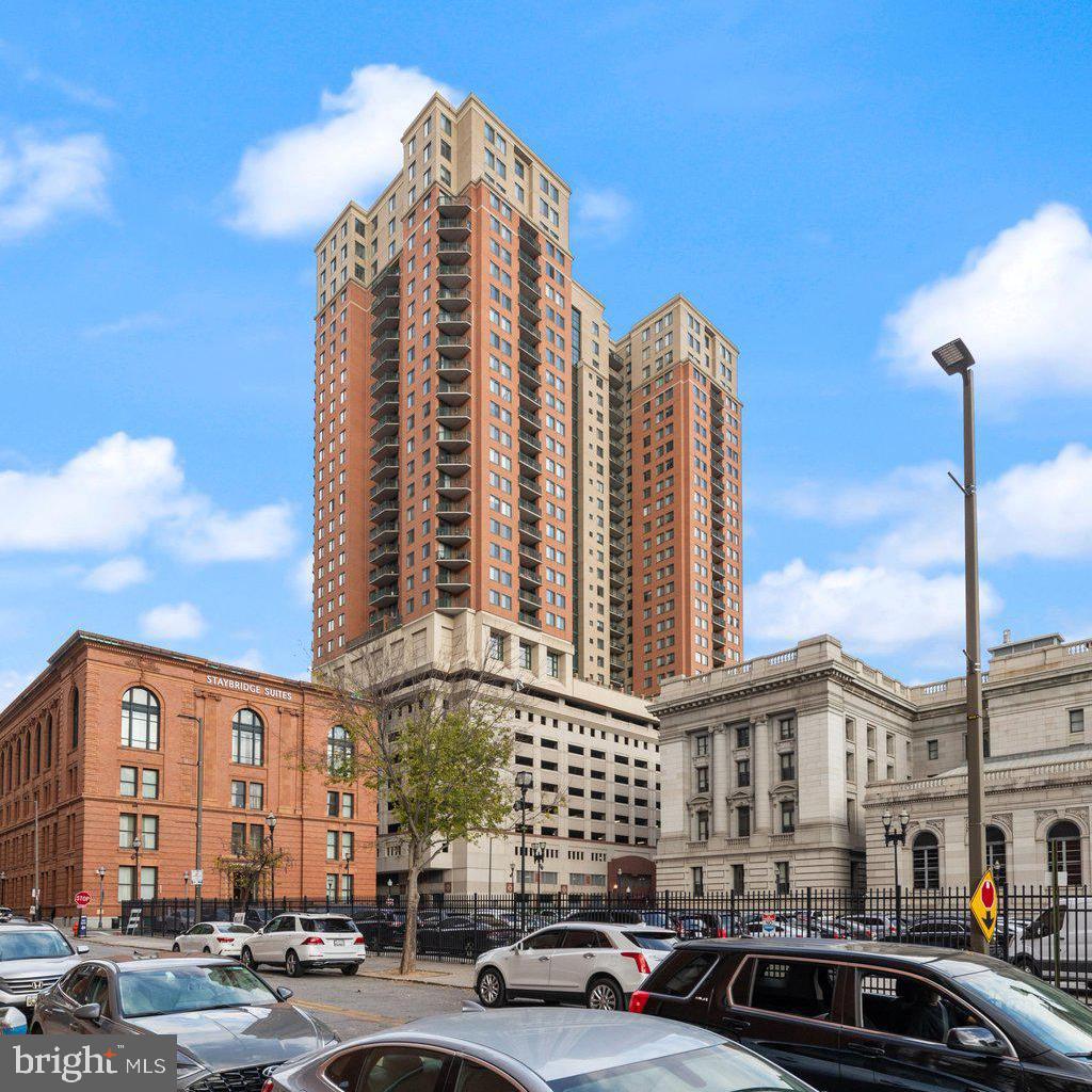 **High-Rise Living with Breathtaking Views **
Welcome to Unit #2312 at 414 Water Street—a stunning 2-bedroom, 2-bath condo perched on the 23rd floor, offering more than 1,000 square feet of modern, open-concept living space with panoramic views of Baltimore’s skyline.
Step inside to discover an elegant interior featuring gleaming luxury vinyl flooring in the living area, a charming fireplace, and plush carpeting in both bedrooms for added comfort. The generous primary suite is your retreat, complete with a spacious walk-in closet and a private en suite bath. A second bedroom paired with a full guest bath provides versatile space perfect for a home office or accommodating guests.
Relax on your private balcony and savor incredible sunny vistas. The condo also offers everyday conveniences such as an in-unit washer/dryer, secure garage parking, and access to a nearby storage unit.
Residents of 414 Water Street enjoy a wealth of premium amenities, including a 24-hour concierge, a state-of-the-art fitness center, dedicated business and lounge areas, and a pool complete with grilling stations—ideal for both relaxation and entertaining.
Schedule your private showing today and elevate your urban lifestyle!