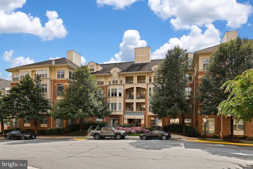 Beautiful condo in the heart of Reston with super walkability! Couple the best location for living and commuting with a spacious 2 bedroom/2 bath corner unit with a sunroom and you have the epitome of condominium living. Located in the Stratford Community with the best amenities and across the parkway from the Reston Town Center with Whole Foods, TJ's, Target, close to Silver Line & Reston Station Metro, easy access to WO&D Trail, only 12 units per floor very quiet, this home has a 2018 renovated master bath and custom built-ins surrounding the gas fireplace. This Stuart model has the popular split-bedroom floor plan with larger open living area. The Stratford is popular due to secure buildings, concierge, pool and hot tub, exercise facility, social room with kitchen and tree-lined streets. Minutes to Metro, Dulles Toll Road and 495. Walk to Reston shops and restaurants. Unit includes one reserved garage parking space and a 128-cubic foot protected storage unit in garage. A/C unit replaced 2021 (rooftop), New Refrigerator 2024, Furnace unit replaced 2015