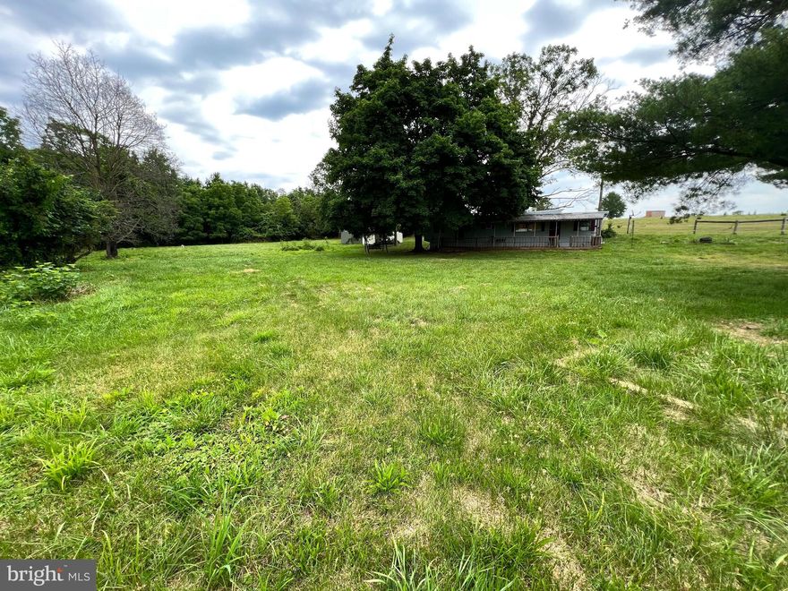 Don't miss out on this opportunity! Gorgeous, cleared, and level lot with stunning views! You can rehab the trailer and make it a getaway or demo it and build your dream home minutes from downtown Thurmont! Check out those views of the mountain and pastures! Property has working septic, well, and electric already hooked up and is ready for its next owner! Thurmont is tucked in Frederick County and is close to state and national parks, hiking, waterfalls, wineries, and various town events and festivals including parades, 4th of July, and Colorfest. If you're looking for a retreat or a quiet home - this could be it! The sky is truly the limit with this one! Come check it out today!