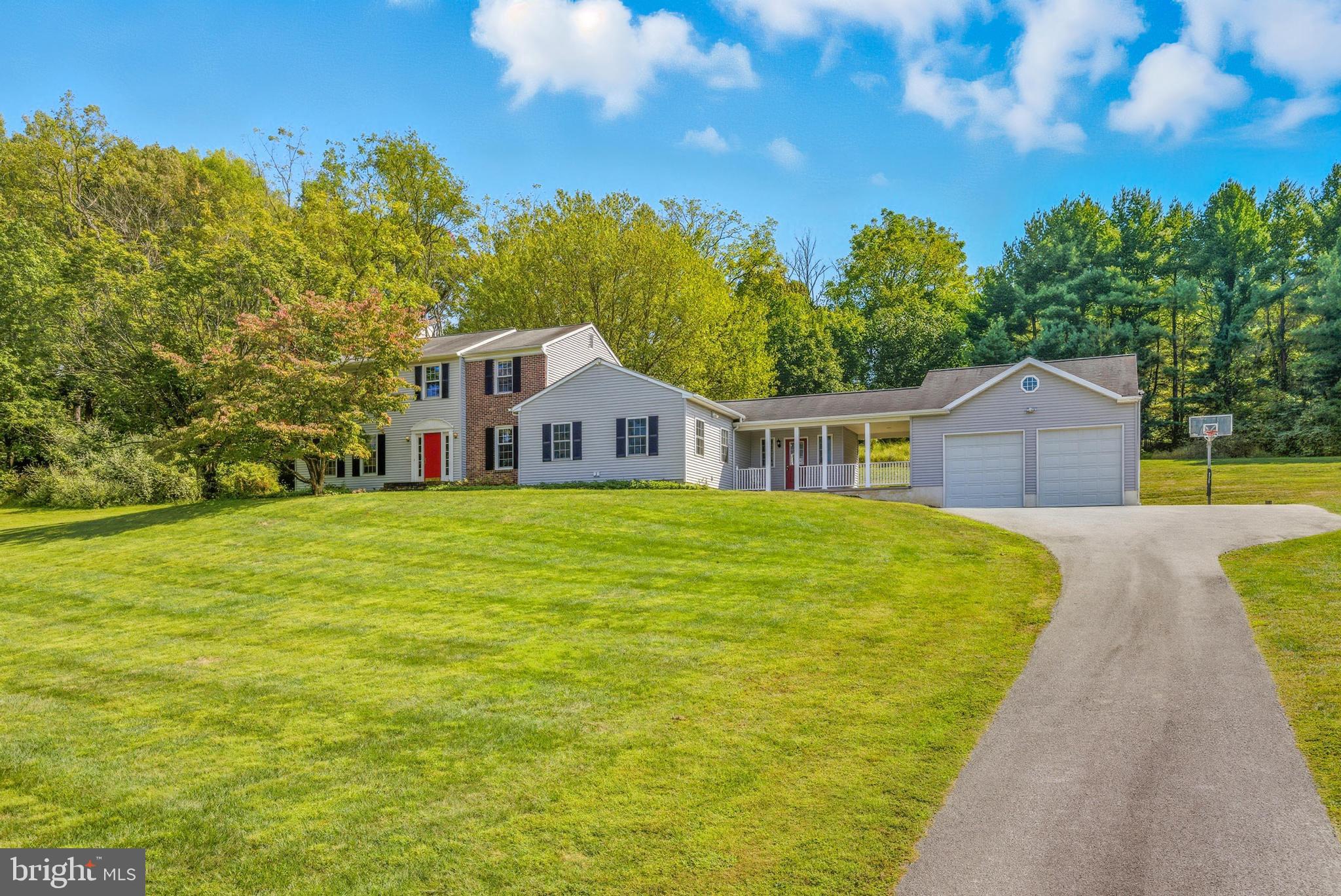 Welcome to 800 Dowlin Forge Road in the sought after Downingtown East School District. Looking for more distance between you and your neighbors? We have you covered. Nestled on 2 roomy acres, this home offers the ultimate privacy in rural setting with NO HOA. It’s hard to believe you’re just a few minutes drive to all of the conveniences of modern life including Eagleview, Target, Wegmans, the Turnpike, Schools, Nature Trails, Marsh Creek, Shopping & Dining. This 3,700+ square foot beauty shines with fresh interior paint, new carpets & gleaming hardwood floors. Step into the remodeled classic kitchen boasting granite countertops, tile backsplash, stainless steel appliances, double oven and a huge pantry. You’ll love the oversized family room with recessed lighting-perfect for family gatherings or movie nights. Upstairs, the owner's suite impresses with a walk-in closet with built-in organizers and a remodeled bath featuring a tile shower with glass door and built-in bench. Other features you’ll enjoy include convenient main-floor laundry, tiled mudroom, private office/study, a finished basement and an oversized two-car garage with extra high ceilings, loft storage and even more storage space behind the vehicle bays. Nestled in Chester County's rolling hills it's your own little slice of paradise - schedule a showing today!