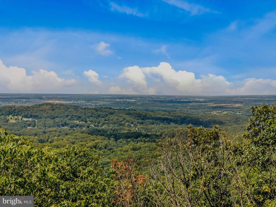 Build your dream home on this private 5.37-acre lot with truly breathtaking mountain views! Tucked away on a peaceful road, this property offers the perfect balance of seclusion and convenience—just minutes to the Virginia line, Lake Shannondale, the Shenandoah River, Appalachian Trail, historic Harpers Ferry, local breweries, and more. The land was previously perced, and phone, cable, internet, and electricity are all available at the site. Whether you’re seeking a full-time residence or a weekend retreat, this parcel is a rare find in the Harpers Ferry market.