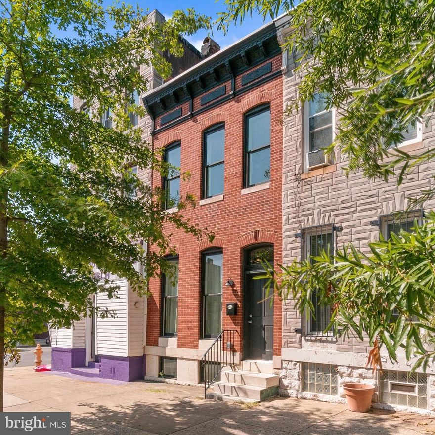 Home Warranty Included! Welcome to this stunning brick-front townhouse in the vibrant Oliver neighborhood of Baltimore City. This 2-bedroom, 2.5-bath home blends historic character with modern upgrades, featuring iconic marble steps, decorative brick fireplaces, and intricately detailed architectural touches throughout. 

Step inside to find gleaming hardwood floors, recessed lighting, and a striking half-circle arched hallway that leads through a beautiful floor plan. The open staircase overlooks a formal dining room which opens to a fully equipped kitchen. The kitchen features Whirlpool stainless steel appliances, tall soft-close cabinets, a breakfast bar with elegant pendant lighting, a built-in wine rack, and sleek countertops. Upstairs, the primary bedroom suite offers a luxurious spa-like bathroom and walk-in closet, while the second bedroom is equally spacious. The home also includes a laundry closet on the upper level for added convenience. Enjoy a low-maintenance, fenced backyard perfect for entertaining, a full basement, plus the comfort of a brand new central HVAC with a new water tank and expansion tank. 

This home is located in a strong and supportive community with an active neighborhood association dedicated to enhancing the Oliver neighborhood. 1602 N Bond Street offers not just comfort but a sense of belonging. Don’t miss the opportunity to make this beautiful townhouse your home—schedule a tour today!