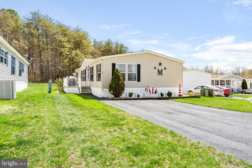 This meticulously kept, manufactured home is brimming with undeniable charm and features three spacious bedrooms and two well-appointed bathrooms. Enhanced by a fresh and tastefully painted interior with a fireplace in the living room to keep you cozy on cooler nights. This home exudes warmth and welcoming vibes. 
Worry less about additional expenses such as the HVAC system, which is only 4 years old, and the roof is fairly new at just 3 years old. Note that there are no annual taxes, which is sure to appeal to budget-conscious buyers. Please remember to verify the amount of ground rent. 
The home comes equipped with a range of amenities that many prospective homeowners seek. Included in the sale is a washer and dryer set for all your laundry needs, a refrigerator to store pleasant meals, and a range for daily cooking. There's also a conveniently included shed for all your storage needs, alongside a separate storage bin for additional space. 
Step outside to greet the morning or unwind during the evening on your nice-sized deck, perfectly suited for relaxation or entertaining. This home intertwines functionality with charm and is ready to welcome its new owners.  
The ground rent includes your annual taxes, metered water, and trash. The buyer should be verified with the office for the present ground rent, and the application to move into the development. The application fee is $20 per person over 18 years of age. The application can be picked up at the office. 
Make this your new place to call home. Contact us for a viewing today.