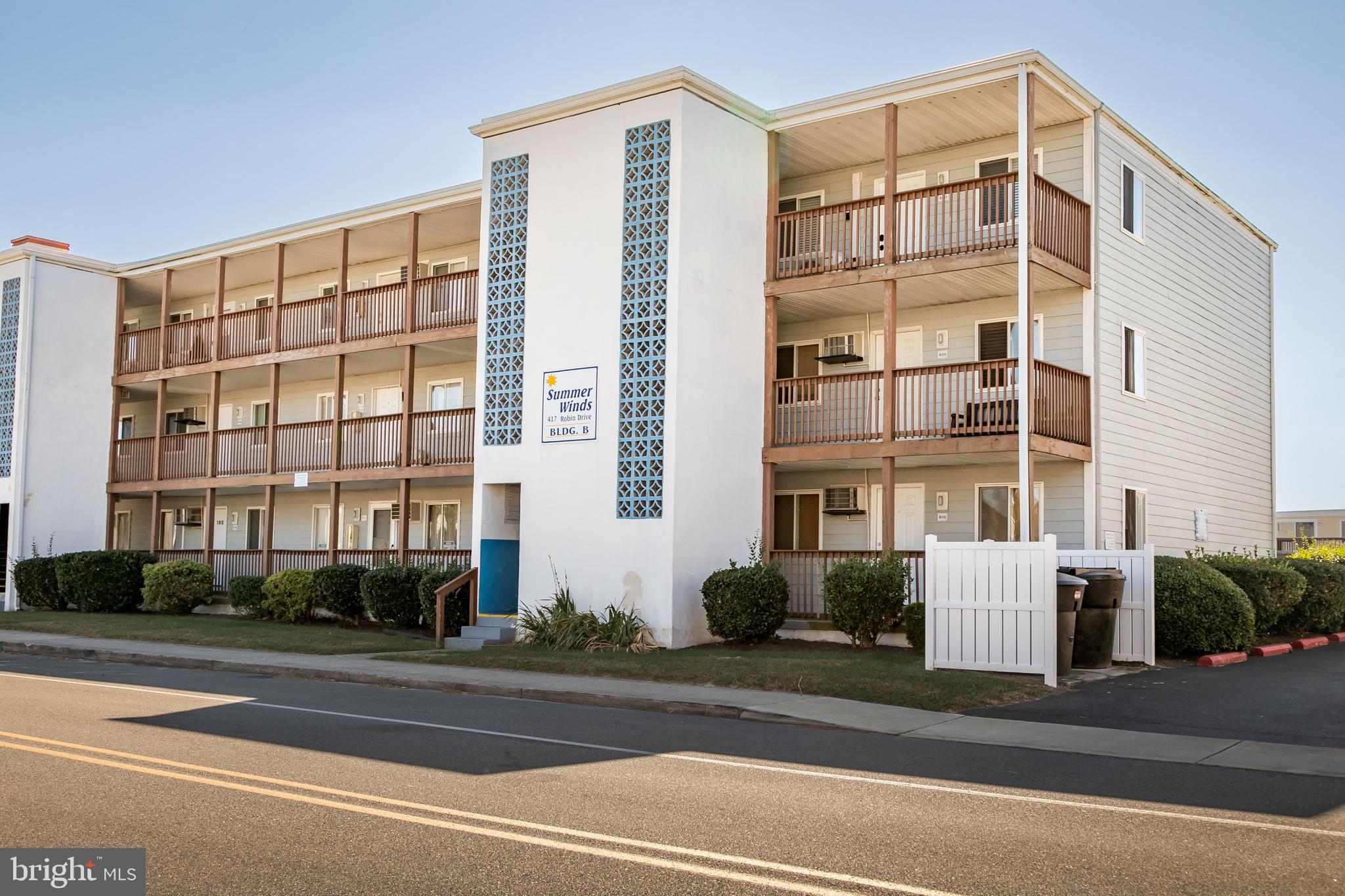 Experience coastal living at its finest in this nicely renovated two-bedroom condo, boasting views of the pool and distant bay. Perfectly located, you’ll be just a short distance away from Ocean City's prime attractions and exceptional restaurants. Enjoy exclusive access to a relaxing picnic area with grills and private bicycle racks, a rare find in OC condos. Adventure awaits at Jolly Roger's Water Park, just a short walk away, where you can enjoy thrilling rides and a free circus show. Indulge in local favorites like Seacrets for live music and waterfront dining. With the world-famous Boardwalk, top-rated beaches, and vibrant arts events at your doorstep, this condo is the ideal retreat for relaxation and fun. It comfortably sleeps six, new porcelain floors, new hot water heater, new dishwasher, offering potential rental income when you're not enjoying your own beach getaway. Pack your bathing suit and get ready for a summer of unforgettable memories!