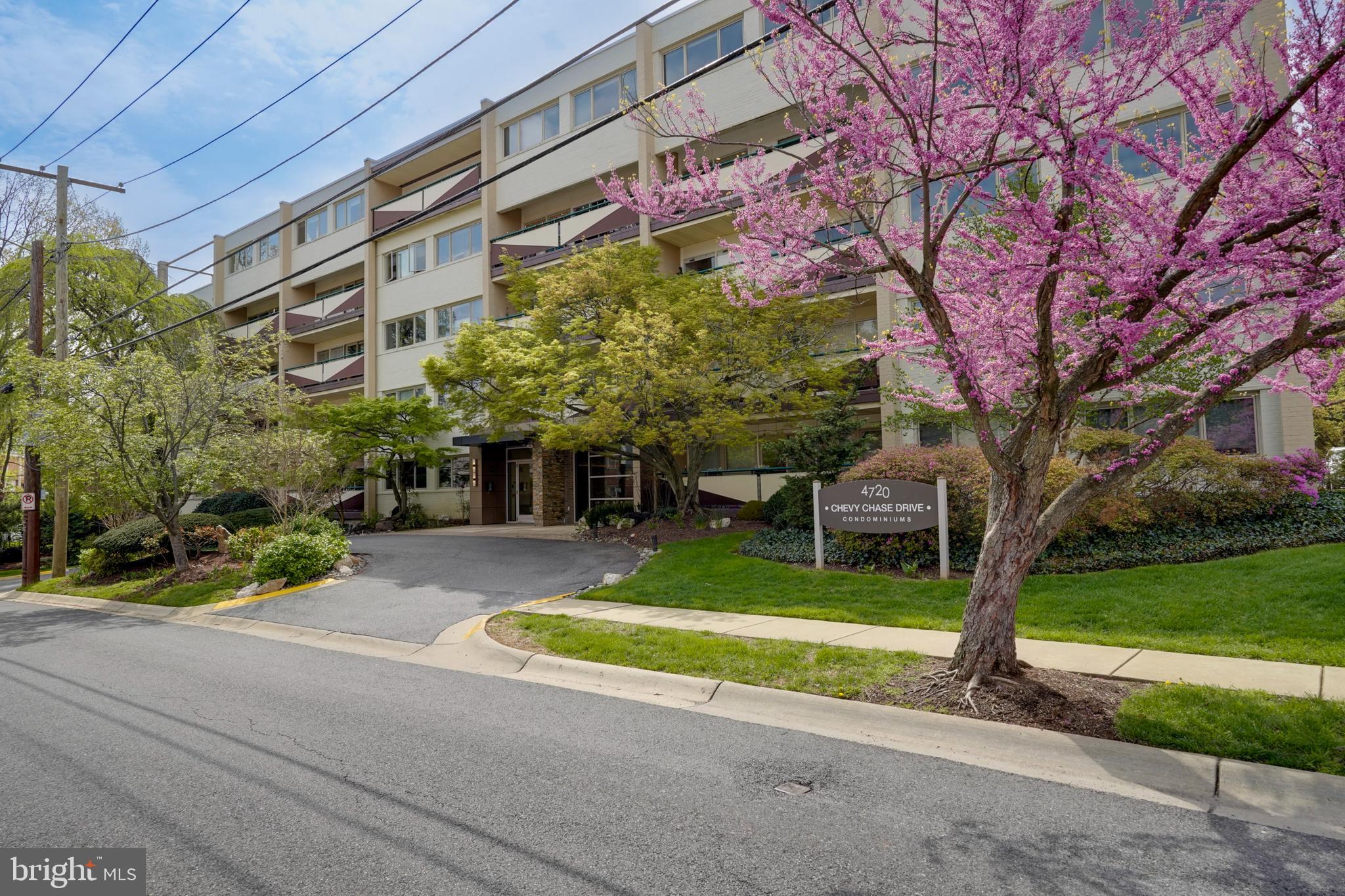 A perfect blend of urban living and green space—this beautifully updated 3-bedroom, 2-bath condo is just minutes from Downtown Bethesda, Norwood Park, and the Capital Crescent Trail. Located in a well-managed, boutique building of only 35 units, this residence offers space, style, and convenience in one of Bethesda-Chevy Chase’s most desirable locations.
Inside, a welcoming marble-floored foyer opens into a spacious and elegant living room, paired with a formal dining area just off the kitchen—ideal for both everyday living and entertaining. The kitchen has been fully updated with quartz countertops, stainless steel appliances, and generous cabinet storage. Crown molding, brand-new luxury vinyl plank flooring, and fresh paint throughout give the space a modern, polished feel.
The thoughtful layout places the primary bedroom suite on the opposite side of the home from the two additional bedrooms, offering privacy and flexibility. Each bedroom is generously sized with ample closet space, and each has its own individual thermostat for personalized comfort. One of the secondary bedrooms features a built-in Murphy bed, making it perfect for use as a guest room or home office.
A large balcony off the living area overlooks lush greenery, offering a tranquil outdoor retreat. The secure building features a recently renovated lobby, beautifully landscaped grounds, and ample guest parking, in addition to your own reserved parking space.
Best of all, the condo fee includes all utilities, landscaping, and snow removal, providing exceptional value and ease of living in a highly walkable, amenity-rich neighborhood.