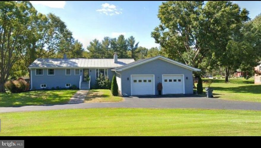 This stunning property is perfectly situated on 1.24 acres. Enjoy relaxing in the heated swim spa.  Entertain on the paver back patio with wooded views. This home offers 3 Bedrooms, 2 Full Baths, 2 Fireplaces and Oversized 2 Car Garage. Hardwood floors throughout main level.  Granite countertops in Kitchen.  Basement Bathroom has been recently renovated. Newer Flooring in Office and Mudroom.  Composite decking.  You will want to call this one HOME!