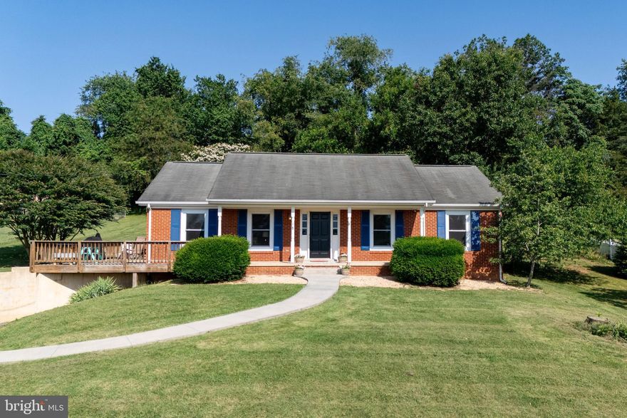 Don't miss this charming 3-bed, 3-bath brick home in the Glenn B. Hudson subdivision! Located in-town and close to Luray Caverns, Skyline Drive, and Yogi Bear’s Campground, this home offers approx. 2,936 sq ft of finished space with an open layout, remodeled modern kitchen, and pretty Blue Ridge Mountain views off the front porch! Recent updates include a new heat pump & A/C (2012), remodeled baths (2021), stainless appliances (2019), and updated windows & doors (2018). The walk-out basement adds great flex space—ideal for entertaining as a 2nd living area, or be used as a huge primary suite. Enjoy the large backyard, freestanding deck, and workshop-ready shed. This house is in great condition and is ready for its next owners!