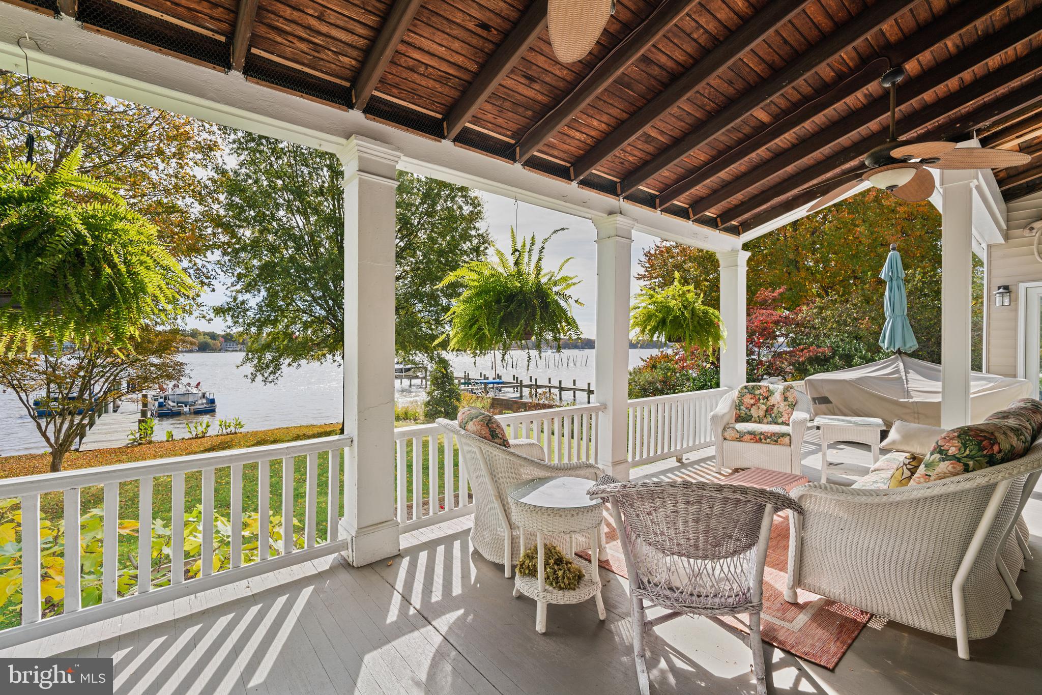 Completely remodeled, this three-bedroom waterfront home boasts a charming front porch and enormous back porch - your private space overlooking the river - along with an enclosed sunroom featuring gorgeous river views through walls of windows. Enjoy abundant outdoor areas and stunning water views from nearly every room. The dock features 3+ feel MLW, with slips available for purchase. This condominium embodies the ideal waterfront living experience. Located in the heart of historic Chestertown, this unique property includes off-street parking and provides the convenience of walking into town for dining and shopping. Situated on Maryland's scenic Eastern Shore, it's less than 85 miles from Washington D.C. and Philadelphia, making it a perfect meeting spot for those in the Mid-Atlantic region.