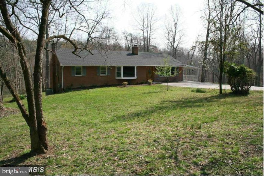 Relax and enjoy the  scenic and peaceful views on the large deck or porch of this 5.23 acre, 4 bedroom Rambler. Two of the bedrooms are on the main level including the Primary bedroom and 2nd bedroom, with hardwood,  a full bath and half bath. The 3rd and 4th bedrooms are on the fully finished lower level with a full bath, with a beautiful fireplace in the rec room.  The home has been well cared for over the years by the same owner who also takes professional care of all outside, yard care of the home. The home is in very popular Clifton, close to shops, restaurants and town, transportation and Robinson pyramid schools. Apply online  to longandfoster,com and call listing agent for details or help.. House is available mid July and is vacant.