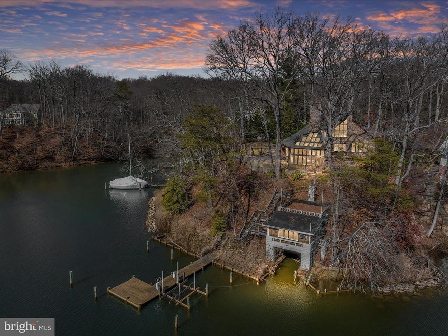 Dreaming of living on the water and enjoying the Annapolitan lifestyle, in one of the sought after communities in Annapolis?? Now is your chance to escape to your very own private waterfront retreat in the sought after gated waterfront community of Epping Forest on the Severn River!! This gorgeous, one of a kind waterfront home with amazing architecture, to include 5 levels of living space, loft area and a private deep water pier.  A 10,000 LB boat lift! This is one of  the few properties in Epping Forest  with a rare BOATHOUSE, containing a party room, could also be the perfect setting for a studio/office with AMAZING views of Saltworks Creek of the Severn River!  This beautiful home includes a gourmet kitchen, 2 newly remodeled baths-downstairs bath has gorgeous new porcelain tile, new flooring in most of home, freshly painted with calming paint palette. New modern front door and solid wood interior doors.   Andersen & Pella windows throughout the home, updated and zoned Heat/AC and roof.  Main level bedroom and full bath.  The 2 car garage conveys with deeded easement. This property has its own private pier. The shoreline is bulkheaded, an the property has a level sunny yard space (which is rare), perfect for entertaining outside to include a huge paver patio, with amazing views. This is a non riparian waterfront. The lovely gated waterfront Epping Forest community is on the Severn River offers tons of amenities to include: communal beach, Clubhouse, billiards, tennis court, basket ball court, playground, Marina and some of the greatest neighbors to enjoy year round activities with including 4th of July Fireworks, Boat Club, Summer Volleyball league, Oyster and Bull roasts and Summer Camps. Now is the time to come home and enjoy living the Chesapeake Bay lifestyle in beautiful Annapolis!!