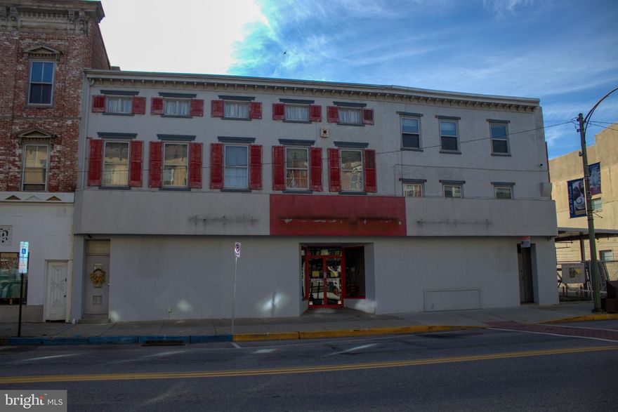 Former Ritter Hardware building.   A gem of a property in downtown Mechanicsburg.  Investors should be interested in an incredible cash flow potential.  Owner occupants can use a great downtown space to open their new business or add a new location to their existing business.  
1st floor store:  approximately 7966 square feet, 2 car garage: approximately 640 square feet.  
2nd floor store area: 1152 square feet, and includes 2 very large 3 bedroom apartments that are both second and third floor.       Parking:  20 spaces.