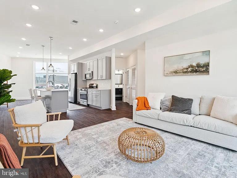 Welcome to 1102 N 2nd Street! This stunning new construction condominium is located in the heart of Northern Liberties, one of Philadelphia's most desirable and dynamic neighborhoods. Situated on the second floor of a boutique building, there are only three residential units available. As you step inside, be greeted by an abundance of natural light pouring in through the floor-to-ceiling windows, illuminating the expansive open-concept layout. With a combined living and dining space, the kitchen serves as the centerpiece. This chefs kitchen features stainless-steel appliances, sleek quartz countertops, subway tile backsplash, 4 burner gas stove, ample soft-close cabinets for storage and is complete with a spacious island with room for barstool seating. Whether you're hosting a dinner party or enjoying a quiet evening in, the seamless flow between the dining and living areas creates an inviting atmosphere for entertaining or relaxation. Off of the living room, you can gain access to the balcony that overlooks all that 2nd street has to offer. This condominium includes three bedrooms, each offering plenty of space & abundant closet storage. The primary suite is complete with a private balcony where you can savor your morning coffee, a spacious walk-in closet, and an en suite bathroom boasting a large stall shower and double vanities. Indulge in the convenience of residing in the same building as the exclusive two-level community fitness center and an underground community parking garage, providing secure storage for your vehicle. Located right off of 2nd Street, your condo is not only steps from some of the most popular bars and restaurants that Northern Liberties such as Figo, El Camino, Urban Village Brewing Company, One Shot Coffee, Standard Tap - but right across the street from Acme, Wine & Spirits, Solidcore, Heirloom GIANT market and so much more! Schedule your showing today!