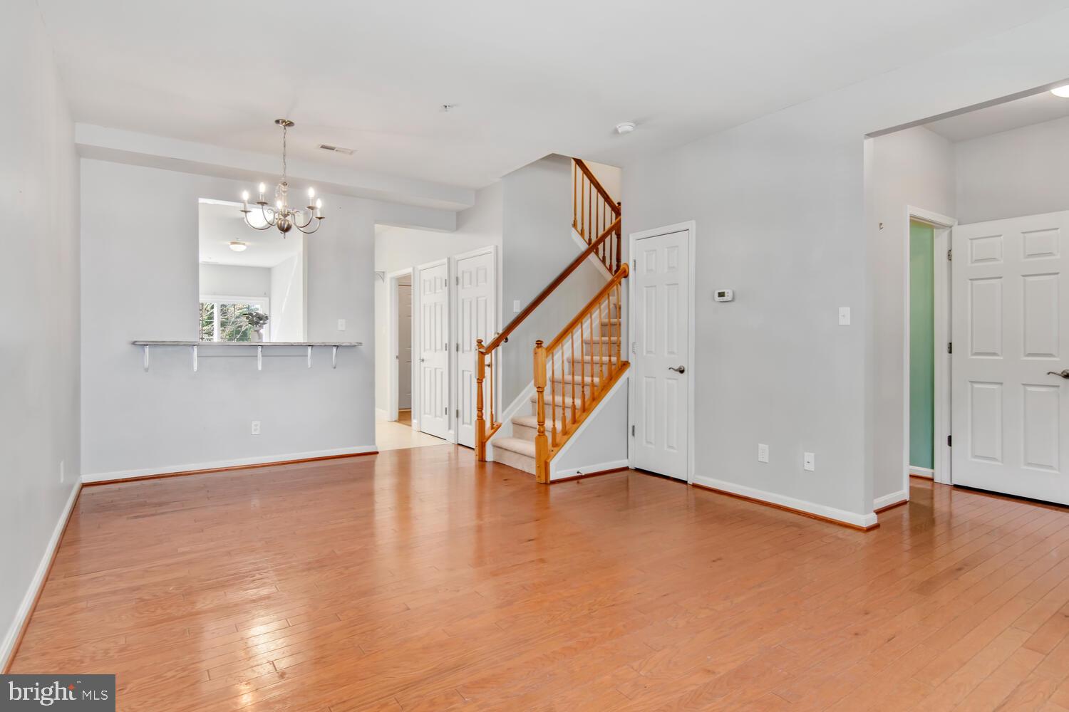 Welcome to this beautifully maintained Easton townhouse that offers far more than meets the eye — including a rare third-floor loft with its own full bath! Step through the front foyer into a warm and inviting living room featuring hardwood floors and 9-foot ceilings. The spacious kitchen is a true highlight, boasting marble countertops, a farmhouse sink, stainless steel appliances, a pantry, and a generous dining area with sliding glass doors leading to the backyard and a peaceful community picnic area. You'll also find a convenient half bath and laundry room on the main level. Upstairs, the primary suite is a true retreat with laminate wood flooring, a walk-in closet, and a private ensuite bath with dual vanities, a separate soaking tub, and a stand-up shower. Two more bedrooms and a full bath round out the second floor.
The versatile third-floor loft is ideal for a guest suite, home office, or creative space — and it comes complete with a full bath. New carpet throughout adds a fresh touch. Enjoy the community’s green space with picnic tables and benches — all just about a mile from downtown Easton!