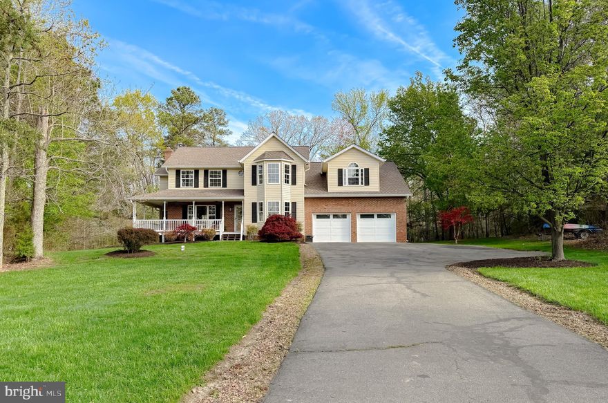 Step inside this welcoming QBH colonial tucked at the end of a peaceful cul‑de‑sac.  A paved driveway leads to a spacious two‑car garage with extra storage, while the wide wraparound front porch sets the tone for relaxed mornings and friendly evenings. Inside, the formal living and dining rooms offer an elegant space for gatherings. The large kitchen features an impressive pantry and convenient access to the garage, making everyday living a breeze. Toward the back of the home, the cozy breakfast area and inviting family room creates the perfect setting for casual time together. A French door opens to a level backyard with multiple patio areas — ideal for outdoor dining, play, and entertaining. Upstairs, you’ll find four generously sized bedrooms and two full baths connected by a wide, comfortable hallway. Beautiful hardwood floors run throughout the entire home, adding warmth and character to every room. The lower level includes a rough‑in for future expansion and currently hosts a pool table that conveys, offering a fun bonus space from day one. This home has been loved, lived in, and ready to welcome its next chapter. Come see it soon.