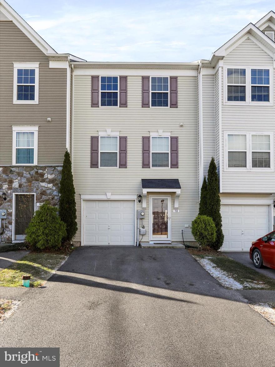 This wonderfully maintained 3 level townhome is ready for a new owner! It is in wonderful condition and has had a few newer upgrades. LVP flooring, granite countertops, 42" cabinets, new recessed lighting. Entry level basement garage allows you inside access and additional storage. You'll find a nice size bonus room for your home office OR a playroom for children or flex space. A fenced in yard for your fur friends is right off of the bonus living space. The main floor features a lovely kitchen with a generous sized island and plenty of space for your kitchen table. Lots of seating space for entertaining. Upstairs you'll find 3 cozy bedrooms and 2 full baths. primary bedroom has a walk in closet and private bath.  Close to main commuter routes, hospital, shopping and dining.