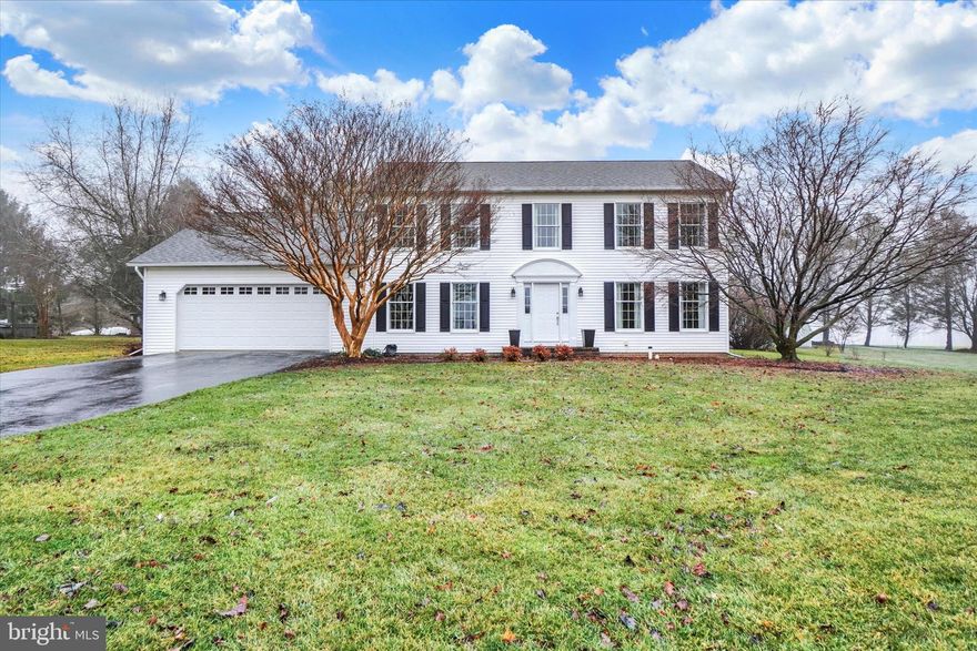 Welcome to this charming 4–5 bedroom Colonial on a level .45-acre lot located on a cul-de-sac street in desirable Bridlewood Farms in Shrewsbury, just minutes from I-83 Exit 4, shopping and dining. Lovingly maintained and thoughtfully updated by the original owners, this home offers both comfort and functionality inside and out. The private backyard is beautifully landscaped with hydrangea bushes, perennial gardens that bloom from spring through fall, and mature trees framing a large, open area, covered rear deck and a trellised patio for shade and outdoor enjoyment.
Guests are welcomed into a spacious 10x14 foyer with a large coat closet and warm pine plank floors that extend throughout the main level. The updated kitchen features recessed lighting, granite countertops, an island, and a large pantry, and opens seamlessly to the breakfast area and family room. Two sets of doors provide easy access to the covered deck and patio, perfect for entertaining. The main level also includes a convenient powder room and a flexible first-floor bedroom or office.
Formal living and dining rooms offer additional space for gatherings or relaxing by the cozy gas fireplace. Upstairs, the spacious primary suite features a large walk-in closet and private bath with double sinks and LVP flooring. Three additional bedrooms and a remodeled hall bath complete the second floor.
Additional highlights include an oversized two-car garage, unfinished lower level with excellent storage or future living space potential, and recent updates including a new front door (2026), roof and skylights (2018), water heater (2020), and air conditioning (2018–2019). One-year First American Home Warranty included for your peace of mind.