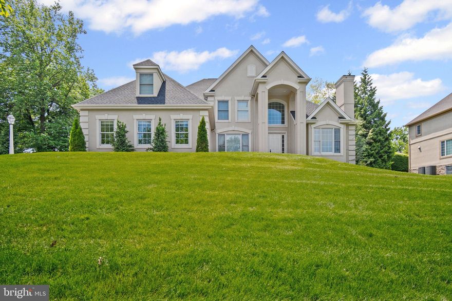 Nestled in the desirable Derry Woods development and Derry Township School District, this home has been completely renovated from top to bottom. Located just minutes from Hershey Med Center and all of Hershey's main attractions! Boasting 5 bedrooms, 4 full and 2 half baths, and over 4,700 sq ft of finished living space (including finished basement), this residence is a true gem. The foyer welcomes you with fresh LVP flooring that flows into the formal dining room and chef-inspired kitchen. The kitchen is complete with quartz countertops, walk-in pantry with a barn door, a large island with barstool seating, built in stainless steel appliances, and a cozy sitting area. The living room is highlighted by a vaulted ceiling, a floor-to-ceiling gas fireplace, and access to the back patio. The spacious first-floor primary suite offers a spa-like bath with a soaking tub, steam shower, double vanity sink, and walk in closets. The secondary main-floor bedroom with an en-suite bath is perfect for guests or in-laws. The enclosed study is complete with a cozy gas fireplace, perfect for those working from home. A conveniently located half bath/laundry room with built ins completes the main level. Upstairs, you'll find three spacious bedrooms, each featuring carpet and closet space with direct access to one of the 2 full baths.  The finished basement features an additional family room, in-home theater, workout room, and half bath. Some of the many perks of this home include: stunning Hunter Douglas window treatments throughout, Control 4 speaker system installed in the primary bedroom, study, dining room, and patio, recently replaced roof, fully renovated bathrooms, updated landscaping, and more.  This one-of-a-kind GEM is move-in ready and waiting for you!