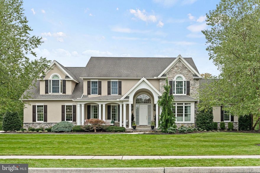 Rare double lot in Forest Hills offering over 5,000 square feet of finished living space, 5 bedrooms, and 4.5 bathrooms. This impressive home combines size, function, and beautiful architectural detail, all set against rare tree-lined forest views.
A grand two-story foyer welcomes you inside. The main level features a formal dining room with wainscoting and tray ceiling, a formal living room with a gas fireplace, and a massive great room with cathedral ceilings and a second gas fireplace. The spacious eat-in kitchen offers abundant room for gathering, a walk-in pantry, and sliding doors leading to a large deck overlooking the private wooded backdrop. Also on the first floor is a bedroom with an attached full bath, making it ideal for guests or multigenerational living, along with a laundry room and half bath.
Upstairs, you’ll find four generously sized bedrooms and a full guest bath. The primary suite is a standout, featuring a beautifully appointed bath with a walk-in shower, soaking tub, dual vanity, dedicated makeup vanity, private water closet, and custom built-in cabinetry. Pocket doors lead to the oversized walk-in closet, complete with a large window that fills the space with natural light.
The fully finished lower level is an entertainer’s dream with a spacious wet bar and plenty of seating, a large carpeted living area, and a cozy gas fireplace. There is also a bonus room perfect for a guest space, playroom, craft room, or office, plus another full bathroom. Approximately 300 square feet of unfinished space provides excellent storage. Outside, the lower level opens to a beautiful patio area with double sided fireplace, creating seamless indoor-outdoor living. A brand new roof was installed in 2025 for peace of mind.