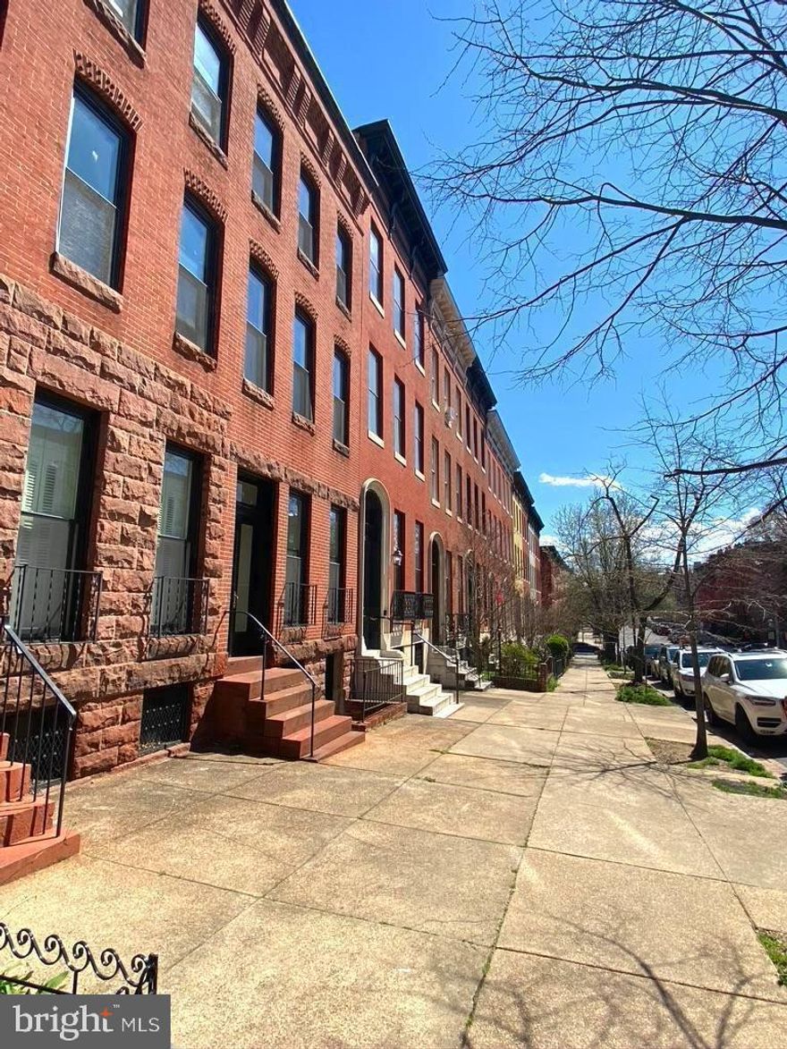 The perks of city living mixed with the feel of a small residential community. Located in Historic Bolton Hill, this top floor unit has so much to offer, starting with tons of natural light. There are two skylights, and large windows, that allows the sun to pour in the apartment. Gleaming hardwood floors are throughout. New stainless steel appliances are perfect if you like to cook or prefer to microwave. Spacious bedrooms on opposite sides of the apartment can be the perfect set up for roommates. Dual entry bathroom, with access from he primary bedroom and living area. Access to shared coin operated laundry room. Conveniently located near the light rail, MARC train, arts district, shopping, dining, and downtown. Nestled between MICA and the University of Baltimore.