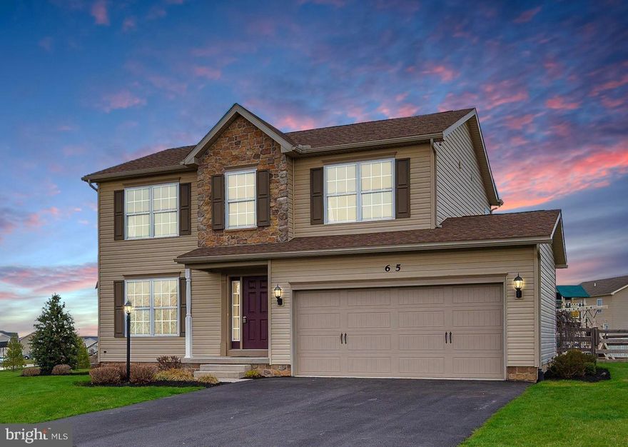 Welcome Home to 65 W Crest View Ln in Gettysburg's Wheatland Acres Community (NO HOA).  Built in 2015, this lovely Colonial shows very well, and has some fantastic amenities for the area!  This community is VERY charming, and houses are rarely available here.  Very convenient location just minutes from the heart of Gettysburg, RT15, Littlestown, Hanover, and the MD line close by.   Features include beautiful Hardwood Flooring on the main AND upper levels, large kitchen with SS Appliances and center island, 2 car attached garage and large driveway, fully fenced rear yard, lovely hardscape patio with built in firepit for entertaining, large primary bedroom with full attached bath and large walkin closet, Upper Level Laundry Room, basement is ready for your personal touches with tall ceilings and egress window so a bedroom could be added, bonus gym/office room in basement as well.  System updates include: Smart home water filter, smart home water softener, smart home water heater, New washer/dryer 2025