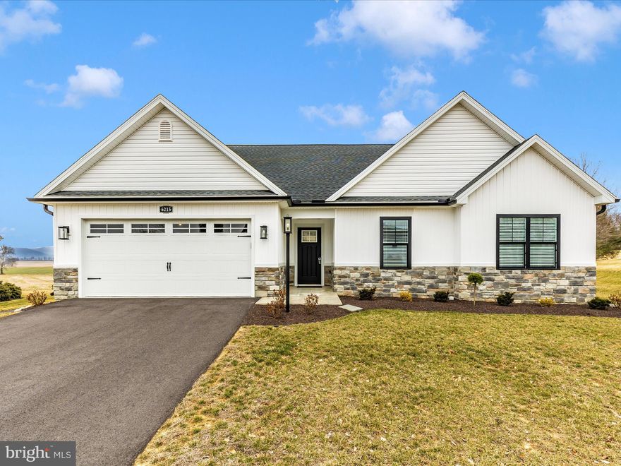 Motivated Seller! Welcome to this brand new 4-bedroom, 2-bath home, perfectly situated on a premium lot (with breathtaking views!) in the highly sought-after Penn National Community. Built in 2024 with exceptional upgrades, this home offers the ideal blend of luxury, comfort, and breathtaking scenic views of rolling farmland and majestic mountains. 

Enjoy the ease of one-level living with a spacious open-concept design that seamlessly connects the living, dining, and kitchen areas. Natural light floods the space through expansive windows, accentuating the luxury vinyl plank flooring, vaulted ceilings, and upscale finishes. The modern kitchen is a chef’s dream, featuring sleek white cabinetry, granite countertops, stainless steel appliances, and stylish pendant lighting for a warm and inviting ambiance.

The thoughtful layout includes an upper-level bedroom, offering a versatile space perfect for guests, a home office, or a creative retreat. Custom closet organizers have been added throughout, maximizing storage while adding a touch of sophistication. The owner’s suite is a true sanctuary, boasting a double vanity with granite countertops, elegant cabinetry, and spa-like finishes.

Step outside to experience one of the home’s most remarkable features—an expansive 14x10 patio, perfectly positioned to take in the stunning, unobstructed views of the surrounding mountains and lush farm fields. The meticulously landscaped yard enhances the home’s curb appeal, while charming stone accents at the entrance create a warm and welcoming first impression.

Located on a quiet, low-traffic street, this home offers a serene setting while still being part of a vibrant community with top-tier amenities. Enjoy 36 holes of championship golf, an outdoor pool, tennis and pickleball courts, yoga classes, and numerous social clubs. Whether you prefer an active lifestyle or peaceful relaxation, this home provides the best of both worlds.

With a premium location, unparalleled views, and a wealth of thoughtful upgrades— custom storage solutions, and enhanced landscaping—this home is move-in ready and truly one of a kind. Don’t miss the opportunity to own a rare gem in Penn National—schedule your private tour today!