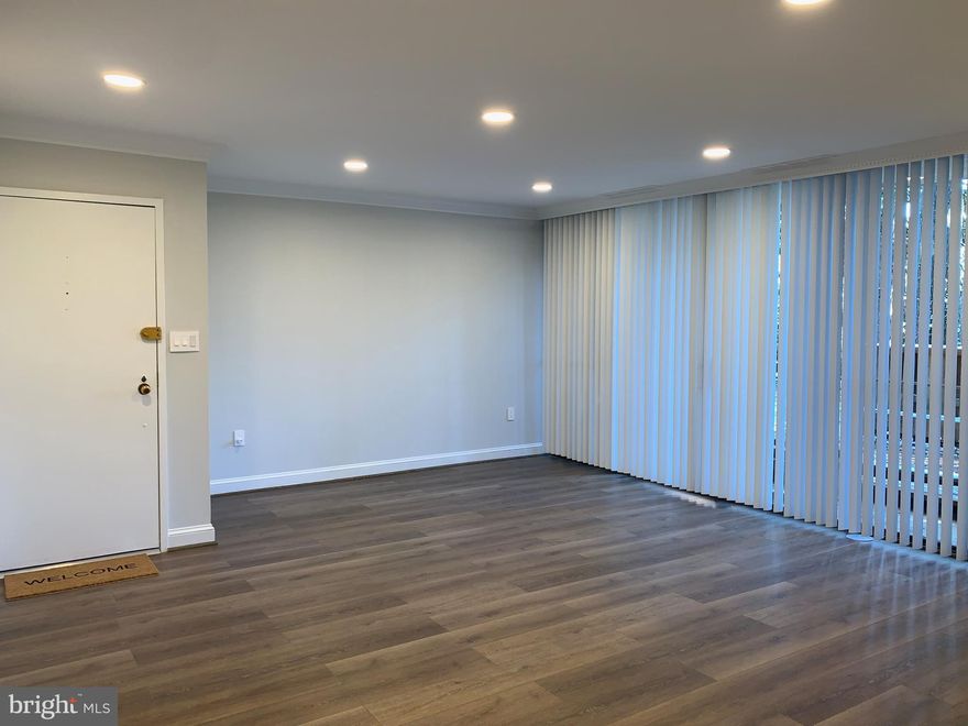 Gorgeous fully renovated, open concept condo with beautiful natural light! Renovations include new flooring, new LED recessed lighting, a stunning bathroom with double vanity and rain shower, new kitchen appliances (pics. will be uploaded when appliances arrive), freshly painted with new outlets and switches.  Enjoy open concept as you walk in the door into the large living room with oversized sliding glass doors to a serene deck (under construction) with views of the trees - private & quiet! Huge primary bedroom with a very large walk-in closet. This unit has an abundance of closet space, as well as a storage unit. Convenient location - walk to Quince Orchard Shopping Center with Aldi, HomeGoods, LA Fitness, Buffalo Wild Wings, and more! Close to The Kentlands, Costco, and NIST. Perfect for commuters - minutes to I-270, Shady Grove Metro, and ICC.
 RENT INCLUDES ALL UTILITIES AND ASSIGNED PARKING SPACE, available as of 2/1/2022.