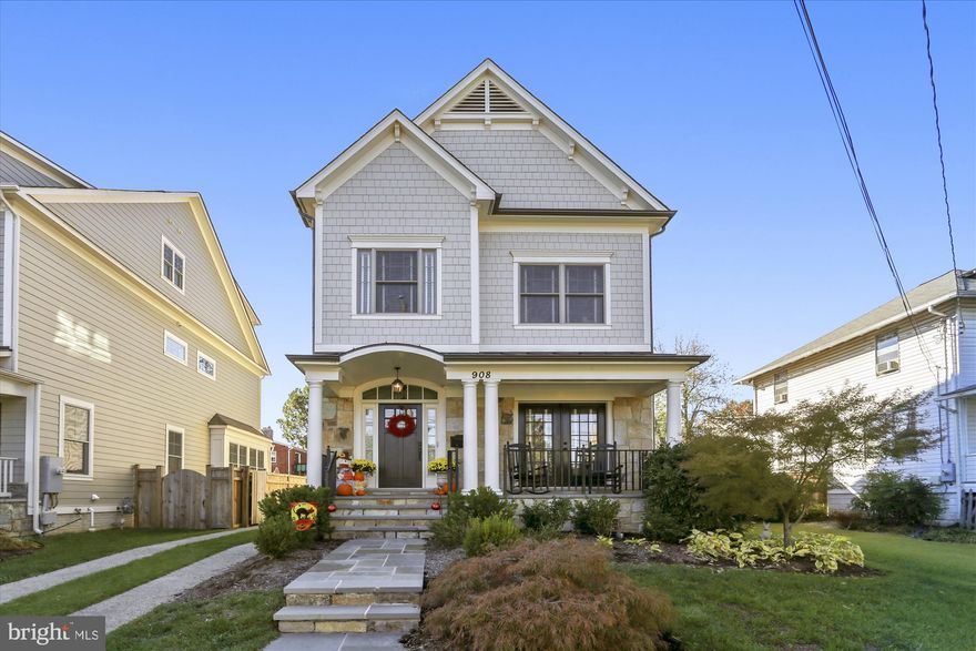 Beautiful 4-level craftsman built by BeaconCrest Homes. Features a 2-car detached garage, fully fenced/gated yard, covered front porch, rear Trex deck, gated stairs to basement, HardiePlank exterior and half a mile to Clarendon Metro! Inside you'll find hardwood flooring, extensive woodwork with wainscoting, crown molding, built-ins, recessed lighting, and lots of windows. The foyer opens to a generous living room, dining room, beautiful white kitchen with 10' ceilings, white bevel subway tile backsplash, slow close cabinets, Bosch stainless steel appliances, gas cooking, granite counters, wine storage, cookbook storage, pantry, 2 ovens, and sunny view of the yard, along with a half bath. The upper level features 3 bedrooms, 2 bathrooms, laundry, a den with custom built-ins, and recessed lighting. The entire 4th level is another master bedroom option with vaulted ceiling, 2 walk-in closets, spacious bathroom with soaking tub, glass enclosed shower, soaking tub, water closet and linen closet. The lower level features a large rec room with chair railing, carpet, recessed lighting, gas fireplace with built-ins surrounding it, door to walk-up stairs, a large storage room half bath, and a 2nd storage area. The home features zoned HVAC systems (2) and a tankless gas water heater.