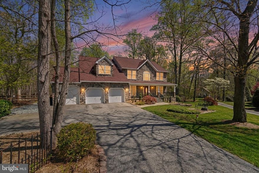 Riding Woods is one of those communities where the lots are wide, the trees are tall, and the neighbors aren't on top of each other. It feels more like a retreat than a subdivision, and when your backyard backs to a permanent stretch of woods, that feeling doesn't stop at the property line.

Inside, hardwood floors and granite countertops carry through the main level, where a formal dining room and a vaulted family room with a wood burning fireplace give the home a warmth that's hard to manufacture. The kitchen was remodeled in 2021, bringing fresh life to the heart of the home. Upstairs, the primary suite is its own destination, with a fully remodeled ensuite and two large walk-in closets that bring a little calm to the busiest mornings. A three-car garage keeps up with everything life accumulates, and the full unfinished basement is a blank slate waiting to become whatever the next chapter calls for, whether that's a playroom, home gym, or a project that builds equity while it builds your vision.

Out back is where this home really earns it. A fenced, in-ground pool anchors a backyard designed for the kind of summers families remember, with a deck, open space, and nothing but trees behind you. The roof and both HVAC systems have all been replaced within the last several years, so the infrastructure is solid and the focus can stay where it belongs. When you're ready to venture out, Compass Pointe Golf Course offers 36 holes and a full practice facility just down the road, and several nearby marinas put the Chesapeake Bay well within reach without the waterfront price tag. Chesapeake school district rounds out everything families are looking for when they're ready to put down real roots.