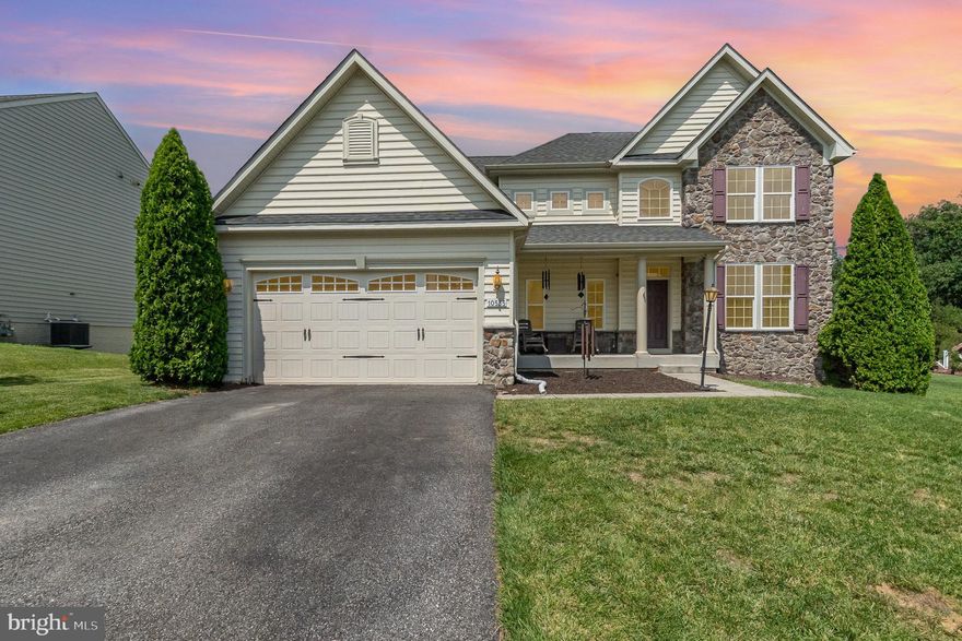 $15,000 PAINT CREDIT AVAILABLE!! VA loan may be eligible for assumption for qualified applicants at 3.25%!! Gorgeous Home Convenient Location, !! Porch front Home,  Walk in to the Bright foyer and open floorplan!!  First Floor Boasts a Formal Living & Dining Room Open Gourmet Kitchen with Stainless Steel appliances, double wall oven, Cooktop, Built in Microwave, Smart Dishwasher and Large Island that overlook the Sunroom!!  Door leads to Deck for additional outside Entertaining space!! Family Room Has a Stone Gas Fire Place as the centerpiece!  First Floor Laundry Room and Mudroom leads to the oversized 2 car Garage!!  Upstairs you have 4 Large Bedrooms! Owners Suite Includes 2 walk in closets and Private Bath with Separate Soaking Tub, Shower as well as a double vanity!!  Finished Lower Level comes with Large Built In wet Bar with Granite Counters & Wine Fridge, Pool Table with Ping Pong Topper Included.. Additional full Bathroom & theatre Room (Theatre equipment/ seating not included but can be purchased separately).. Walk Out Basement to 800+ square foot stamped concrete patio.. Retaining wall 2024, Smart Dishwasher 2024, New water heater 2024, High Efficiency Smart Washer & Dryer 2024, Hard Wired Gigabit Network Switch & Smart Switches throughout!!  Low HOA !!