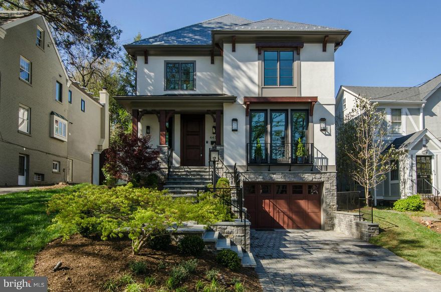 Stunning custom home by Chryssa Wolfe & Hanlon Design featuring Geothermal Heating and cooling, gorgeous kitchen, large living/dining room, bright & sunny FR.. The rear exterior is wonderfully designed to create an outdoor living space with porch, yard, fireplace, water feature & additional dining area w/ built-in grill. Generous 6BR, 5.5BA home w/ garage. Approx 5,800 sq. ft. Built 2015.