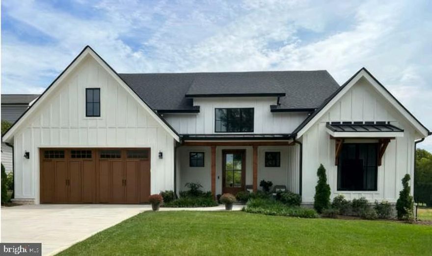 Discover the charm of this stunning new construction home, set to be completed in July 2026. This exquisite ranch-style residence combines modern farmhouse aesthetics with thoughtful design, offering a perfect blend of comfort and elegance. With 3 spacious bedrooms and 2 bathrooms, this home is designed for both relaxation and entertaining. Step inside to find an inviting open floor plan that seamlessly connects the family room to the gourmet kitchen, featuring upgraded countertops and stainless steel appliances, including a double oven and built-in microwave. The kitchen island serves as a central hub for gatherings, while the family room, adorned with recessed lighting and ceiling fans, creates a cozy atmosphere for everyday living. Retreat to the primary suite, complete with a luxurious soaking tub and walk-in closet, ensuring a private sanctuary. Additional features include a daylight basement with interior access, providing endless possibilities for customization, and an entry-level bedroom for convenience. Set on a generous 2.3-acre lot without an HOA, this home offers ample outdoor space for activities and future landscaping dreams. The side-entry garage and driveway provide convenient parking options. Embrace the opportunity to create lasting memories in a space designed for comfort and style. To be build home with similar construction; home pictured is another site.