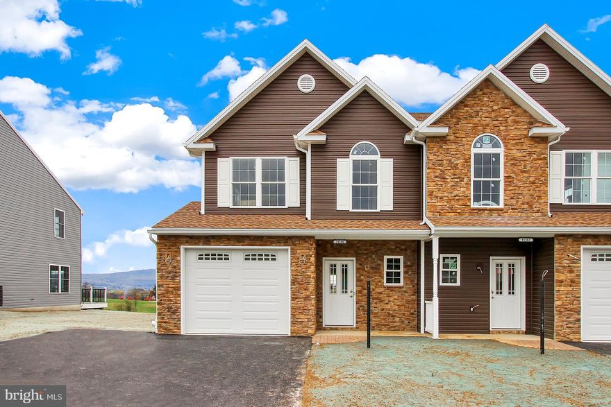 GREAT SOUTHEAST VIEW OF MOUNTAINS FROM LIVING ROOM AND DECK, UPSCALE KITCHEN CABINETS, GRANITE COUNTER TOP, PANTRY, STAINLESS STEEL APPLIANCE, CERAMIC TILE FOYER, KITCHEN & DINING AREA, MASTER SUITE WITH TRAY CEILING, LARGE WALK IN CLOSET, DOUBLE VANITY & 5 FOOT SHOWER, 2ND FLOOR LAUNDRY,  OVER SIZED GARAGE/OPENER, 2 CAR PARKING DRIVEWAY. CROWN MOLDING, CHAIR RAILING. MUST SEE! READY TO MOVE IN.
