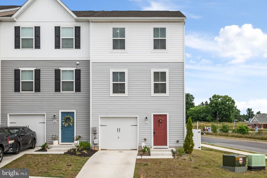 Welcome to 14 Thrower Drive, a stunning end-unit townhome nestled in the highly coveted Dillon Farm community. This meticulously maintained home spans three levels, offering a spacious open-concept floor plan that blends relaxation with entertainment. The kitchen boasts stainless steel appliances, granite countertops, and ample cabinet space, flowing effortlessly into a dining area and inviting living room. Upstairs, the primary bedroom features a walk-in closet and ensuite bathroom, complemented by two additional bedrooms ideal for family or home office. Modern updates include a composite deck and a poured concrete patio, perfect for outdoor entertaining. The large backyard is great for summer barbecues or relaxing evenings, enhanced by a fully fenced yard for added privacy. Conveniently located near I-81, I-70, and Rt 9, this home is perfect for any commuter. With the neighborhood sold out of new-build townhomes, seize this opportunity to own a move-in-ready home without the wait. Schedule your showing today and envision yourself calling this charming house your new home.
