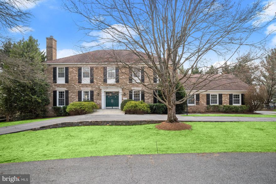 *Newly Priced*Nestled in a quiet cul-de-sac setting within the elegant Potomac Chase neighborhood, 14508 High Meadow Way resides on a private .68 acre lot, offering timeless curb appeal in addition to tasteful interior design notes. Built in 1989, this beautifully updated, expansive Colonial offers 5 Bedrooms, 5 Full Baths and 1 Half Bath across 3 levels and 5,556 square feet of living space, including a fully finished walk-out lower level, updated kitchen and baths, recessed lighting and gleaming Main Level hardwood flooring.

The circular driveway leads guests and residents to the 3-car side-load garage and the slate front path, lined with manicured plantings, to the handsome Main Entry double doors. The Entry Foyer offers a warm welcome, and features curved, hardwood stairs leading to the Upper Level with a second set of curved stairs leading to the Lower Level. The Living Room offers a wood-burning fireplace with a marble hearth and wood mantle; enjoy quality family time in this comforting space. The Dining Room showcases a bay window, chair rails, and a brass chandelier. The inviting Family Room includes a gas fireplace, built-in bookshelves and cabinets and a French door leading to the Screened Porch; convenience and comfort all in one room! The Island Kitchen boasts granite counters, tiled backsplash, double wall ovens, pantry cabinets, and updated high-end stainless steel appliances. The Breakfast Area is open to the Family Room and includes greenhouse windows, an iron chandelier and Rear Deck access; spend quiet mornings enjoying lovely views in this charming space. The Butler’s Pantry includes a bar sink and icemaker – perfect for a bar or coffee bar! The Office, a Powder Room and the rear hall with garage access complete the Main Level’s offerings. 

Ascending to the Upper Level, The Primary Bedroom Suite showcases a spectacular outfitted walk-in closet with double doors and tile flooring, an ensuite Primary Bath and double doors leading to the attached Sitting Room/Office Space. The spa-like Primary Bath boasts tile flooring, a corner soaking tub lit by a chandelier, an oversized stall shower with multiple shower heads, storage niches, bench seating, a large double vanity with vessel sinks, a storage tower with pendant lighting, and a water closet with an additional sink and window. On the other side of the hall, the secondary Bedrooms await; the second Bedroom includes a walk-in closet and a front window, the third Bedroom includes a lighted ceiling fan and 2 rear windows, and the fourth Bedroom includes a lighted ceiling fan, walk-in closet and 2 rear windows. The first Full Hall Bath features tiled flooring, a stall shower with tile surround, an updated vanity and vanity light, a mirrored medicine cabinet and a window. The second Full Hall Bath includes herringbone tiled flooring, a double vanity with marble top, vanity lighting, a mirrored medicine cabinet, and a tub shower with tiled surround. The Upper Level’s offerings are complete with an accommodating Laundry Room, including a washer and dryer, a utility sink and cabinetry.

Descending to the walk-out Lower Level, the Recreation Room presents built-in bookcases, chair rail molding, and French doors leading to the Rear Patio. This Level also includes 2 remodeled Full Baths, a Home Gym/Bonus Room and fifth Bedroom with Rear Patio access. A Guest Room and Laundry Closet, including a washer and dryer, complete this Level’s offerings. 

Enjoy the start of the spring and summer seasons in the private, verdant and fenced Rear Yard! Including a Screened Porch, a large Deck, a slate pathway, an Upper Level Patio and Lower Level Patio with a firepit and raised garden beds, this space is a dream come true for all who love al fresco dining, outdoor entertaining and gardening. 

In close proximity to Aberdeen Local Park, Muddy Branch Park, and local dining and convenience stores, 14508 High Meadow Way offers the best of residential living in a serene setting!