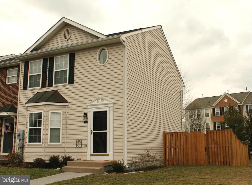 Snuggle by the fireplace this winter. Enjoy coffee on the deck while looking at the beautiful roses. Entertain in the family  room. Enjoy privacy that is close to schools and shopping. Beautiful move in ready townhouse with upgraded counter tops, new floors, new carpet and new ss appliances.  Beautiful backyard fenced in for privacy.