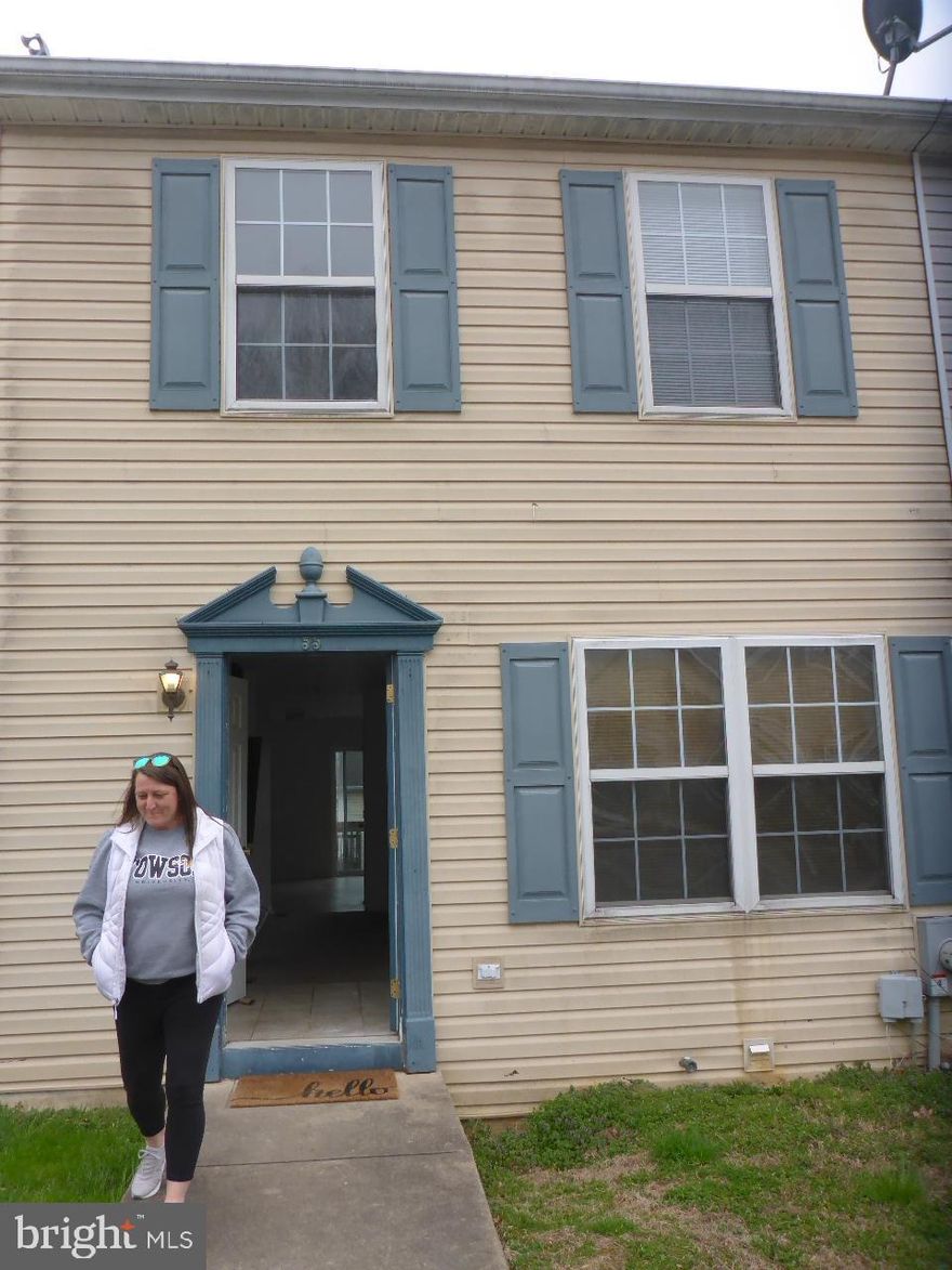 Needs updating but nice interior unit with full unfinished basement.