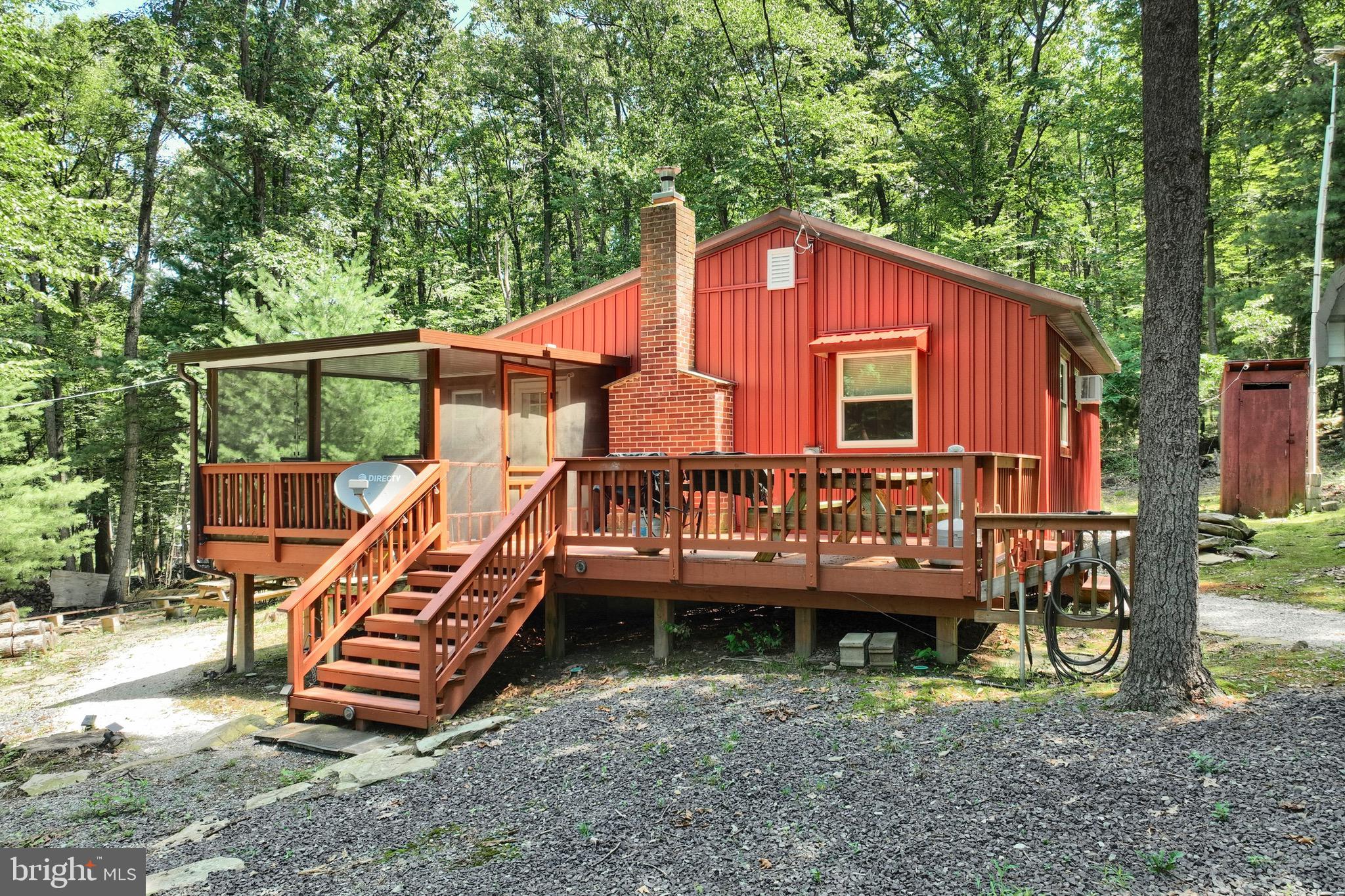 Welcome to this very private 3 bedroom home situated on 4.81 wooded acres. Home has been recently restored and newer updates include flooring, paint, fresh bathroom, & new primary bedroom. Exterior offers new siding, sun porch, deck, double carport, shed, RV plug in, newer well, & fire pit. All appliances, fireplace with insert, furnishings, & TV's are included. Enjoy watching the wild turkey, deer, small wildlife, and maybe a bear! Land is fairly level with mature trees, and front of home offers southern exposure.
Property is near a golf course, wineries, and just minutes to Michaux State Forest offering snow mobile trails, dirt bike trails, hunting and hiking. Just a short drive to route 15, and Historic Downtown Gettysburg.
This home is a must see!