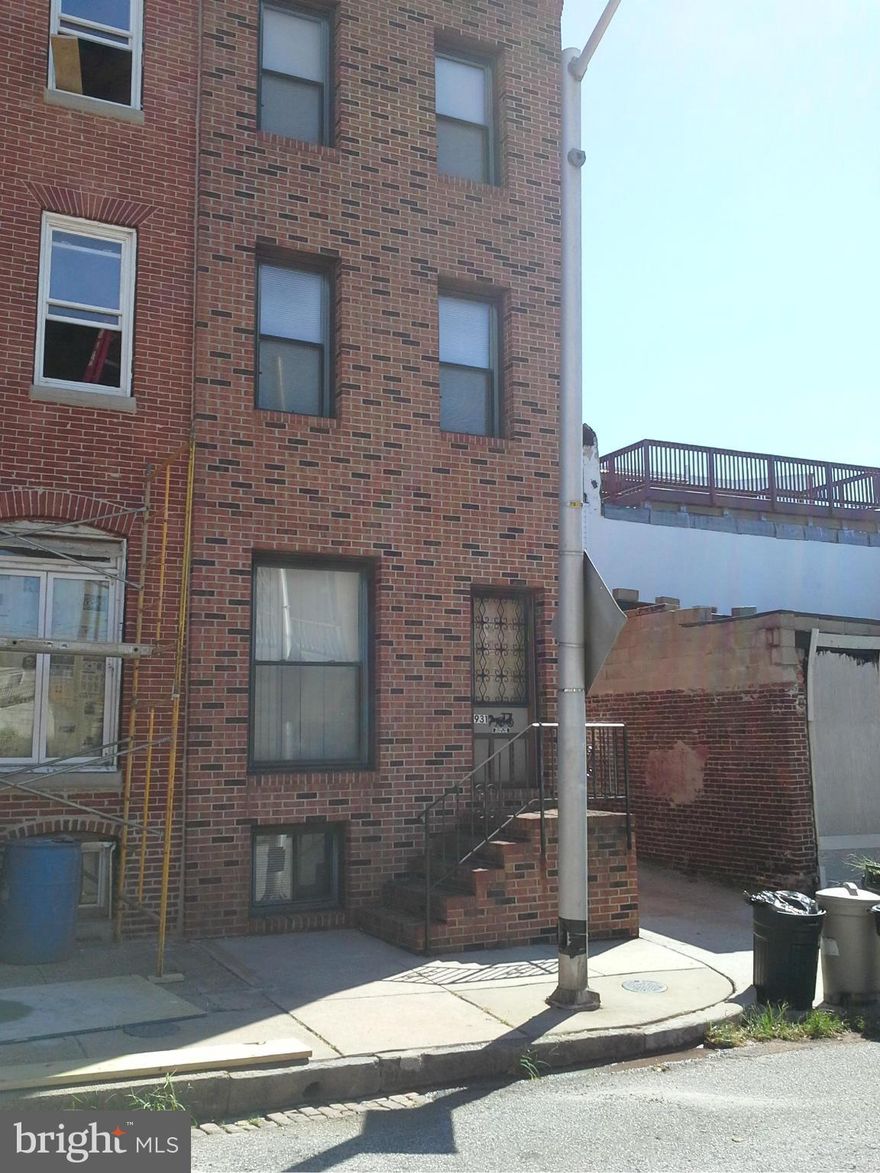Rare find. 3 story, 3 unit End of Group in Canton, just a block above O'Donnell St and Canton Square,  Brick front and all replaced windows,