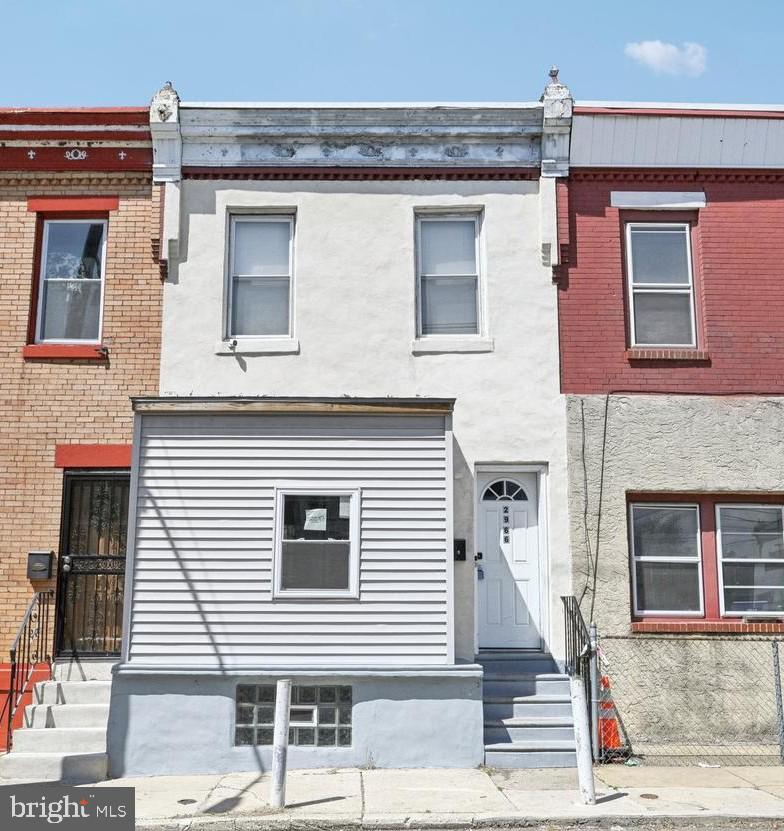 Beautifully updated rowhome located in the heart of Allegheny West, where modern design meets timeless character. Once inside discover a bright and airy open-concept main floor, featuring hardwood floors and stunning exposed wooden beams that add warmth and architectural charm. The spacious living room flows seamlessly into the dining area and kitchen, complete with stainless steel appliances, sleek grey shaker cabinets, and a classic tile backsplash—perfect for everyday living and entertaining alike. At the rear of the home, a dedicated laundry room offers added convenience with a utility sink and built-in cabinetry for smart storage solutions. Upstairs, you'll find two generously sized bedrooms, including a primary suite positioned at the front of the home with double closets for ample wardrobe space. A well-appointed full hall bath is shared by both bedrooms, and a hall walk-in closet adds even more storage to the upper level. The finished basement provides versatile additional living space—ideal for a home office, media room, or workout area—along with an unfinished section for all your storage needs. This home effortlessly combines style, comfort, and function in one of Philadelphia’s most desirable neighborhoods.