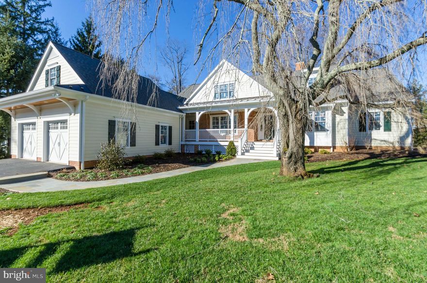 NEW HOME ready for immediate delivery with finest of finishes, detailed millwork, in this desirable location, by REV, Inc.  Exquisitely sited on lush, private 1+ acre lot. Ideal entertaining spaces with massive FR & gourmet Kit.  Main level luxury master suite. 2nd LVL FR/BR#5. Charming front porch & bonus rm rough-in over garage. Finished L L w/full bath  Buyer pays all T Tax & Rec Fees.MHBR#895