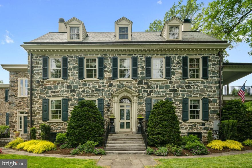 Welcome to Todmorden Hall, a breathtaking, 18th century, classic American residence. History and luxury are perfectly blended to create this unbelievable masterpiece estate. Behold, 2.8 lush and serene acres tucked away in beautiful Rose Valley. The lush property boasts a full-sized tennis court, multiple outdoor gathering spaces, a koi pond, and a detached, 3-car garage with flex space. This home has been painstakingly renovated to all of it's 18th century glory; with ornate and original charm at every glance. No detail has been overlooked in its over 7000 square feet; featuring a chef's kitchen, 5 bedrooms, 5 full bathrooms, 2 half bathrooms, and 4 bonus rooms. Ample windows allow light to flood each room, highlighting soaring ceilings, ornate chandeliers, original fireplaces, beautiful tile work, original molding, built-in shelving, exposed brick, and gorgeous hardwood floors. This bespoke property is rich in American history having once been a strategic outlook during the Revolutionary War and an important link in The Underground Railroad. During their ownership of the property, the famed horticulturalists Mr. and Mrs. Arthur Hoyt Scott transformed the acreage into sprawling and beautiful gardens that still remain. While tucked away and secluded, the estate provides convenient access to downtown Media, Philadelphia, highways, airport, parks, public transportation and more.