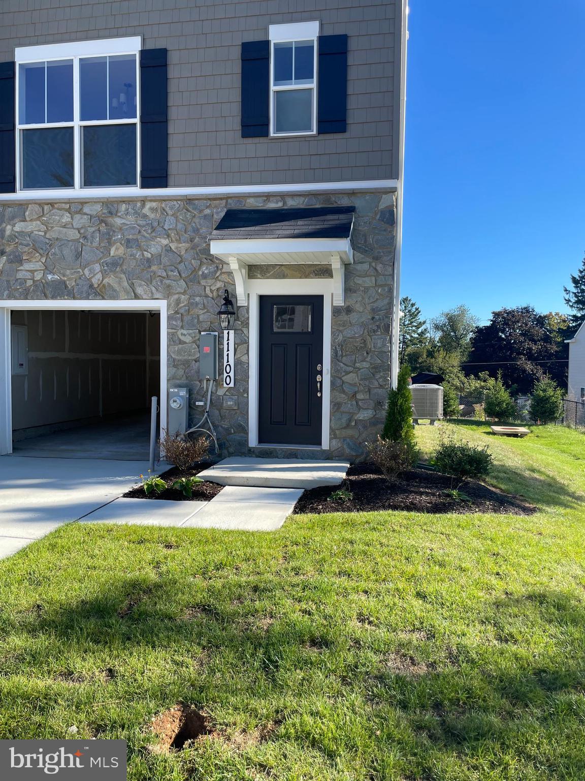 Brand new end unit town house. The Wye townhome offers a one-car front load garage with a craftsman-style partial stone front. Inside, the home comes with craftsman style trim and doors, with luxury laminate floors and carpet. The lower/garage level comes included with a finished rec room and full bath. The main level has an open floor plan with a kitchen perfect for entertaining. The kitchen comes with quartz kitchen counters, and a large kitchen island and included back splash. Kick back and unwind on the 10x18 maintenance free composite deck! Upstairs there are 3 bedrooms, including the owner's suite with an ensuite bath and walk-in closet, a full hall bath and laundry room. See Sales Manager for more details.